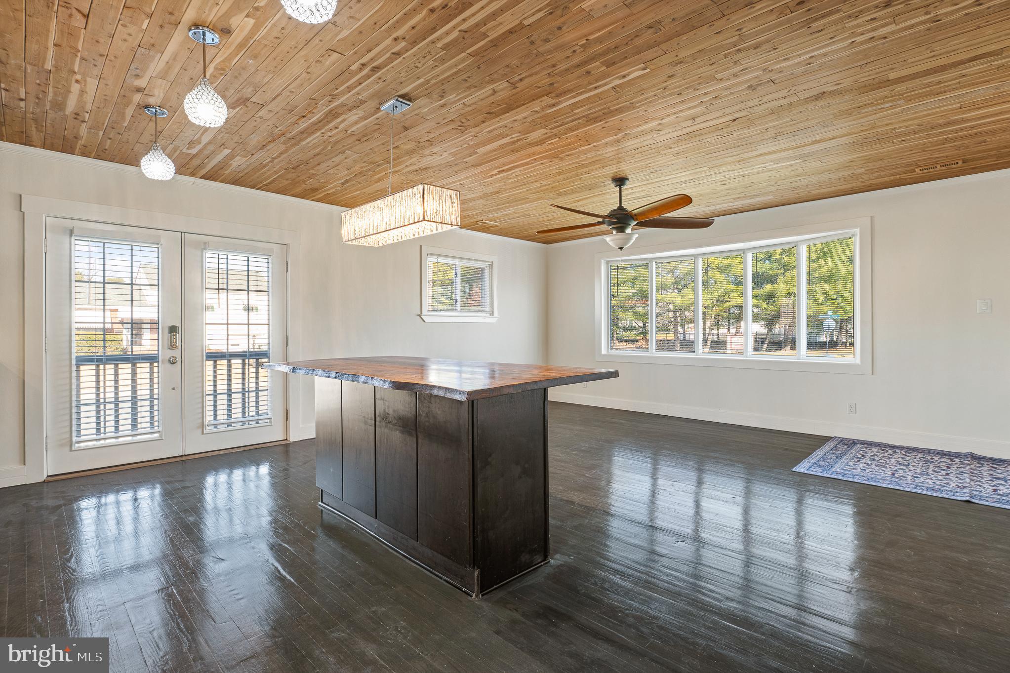 312 North Hammonds Ferry Road Linthicum Heights, MD 21090 - Photo 15 of 56 a view of an empty room with wooden floor and a window