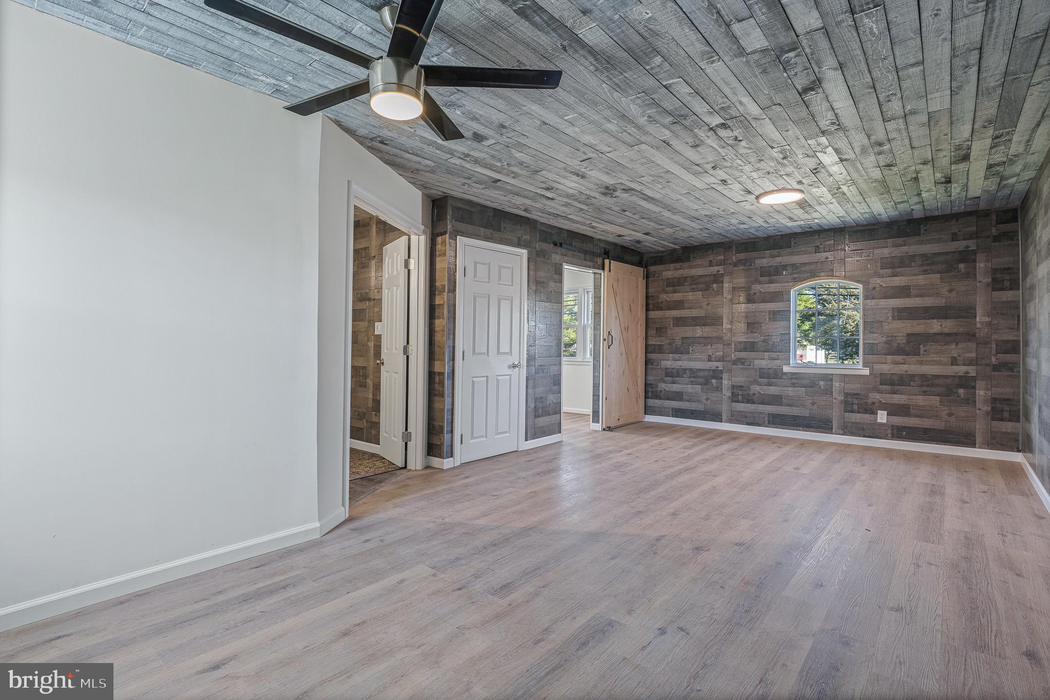 312 North Hammonds Ferry Road Linthicum Heights, MD 21090 - Photo 25 of 56 a view of an empty room with a window