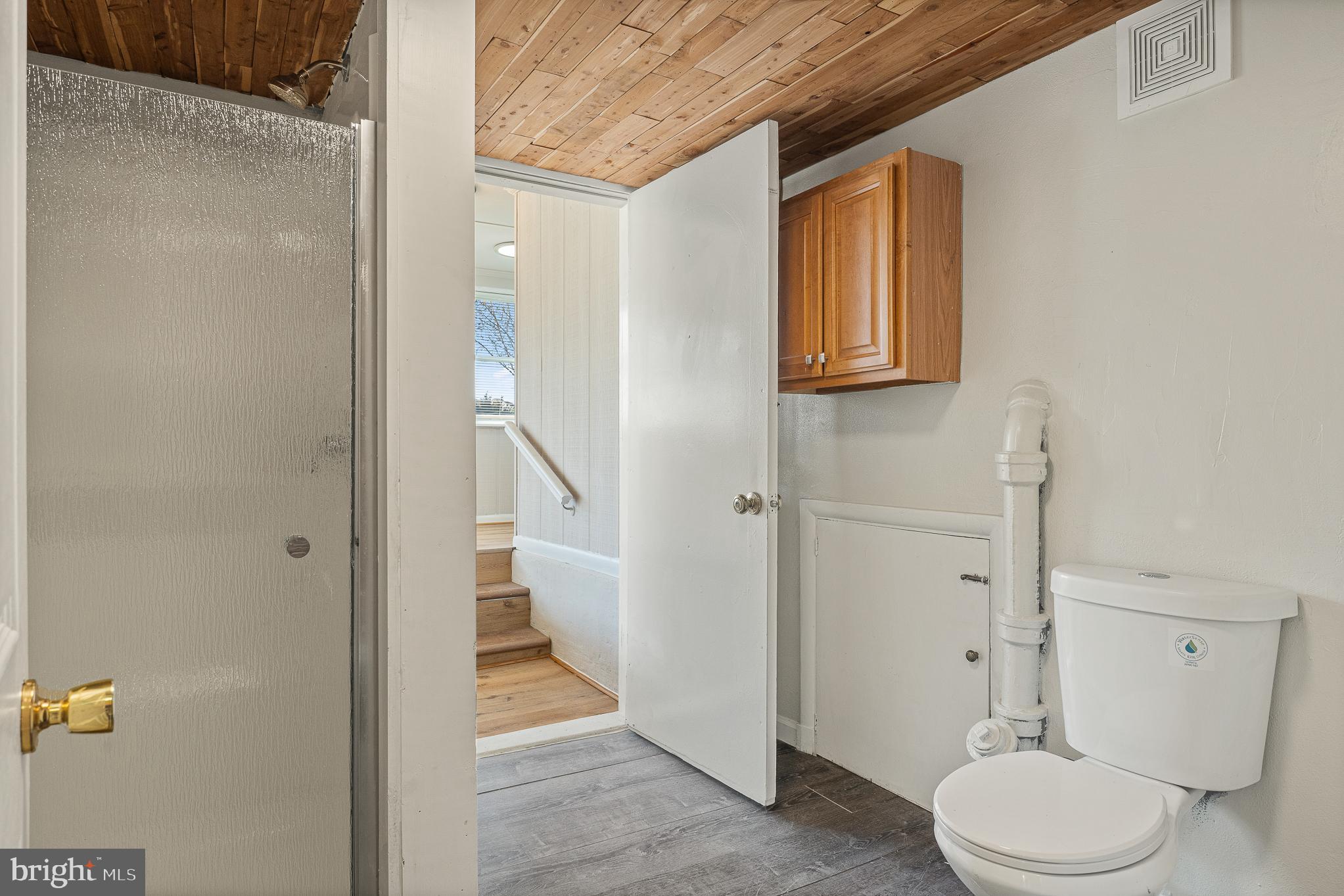 312 North Hammonds Ferry Road Linthicum Heights, MD 21090 - Photo 44 of 56 a bathroom with a toilet and a shower