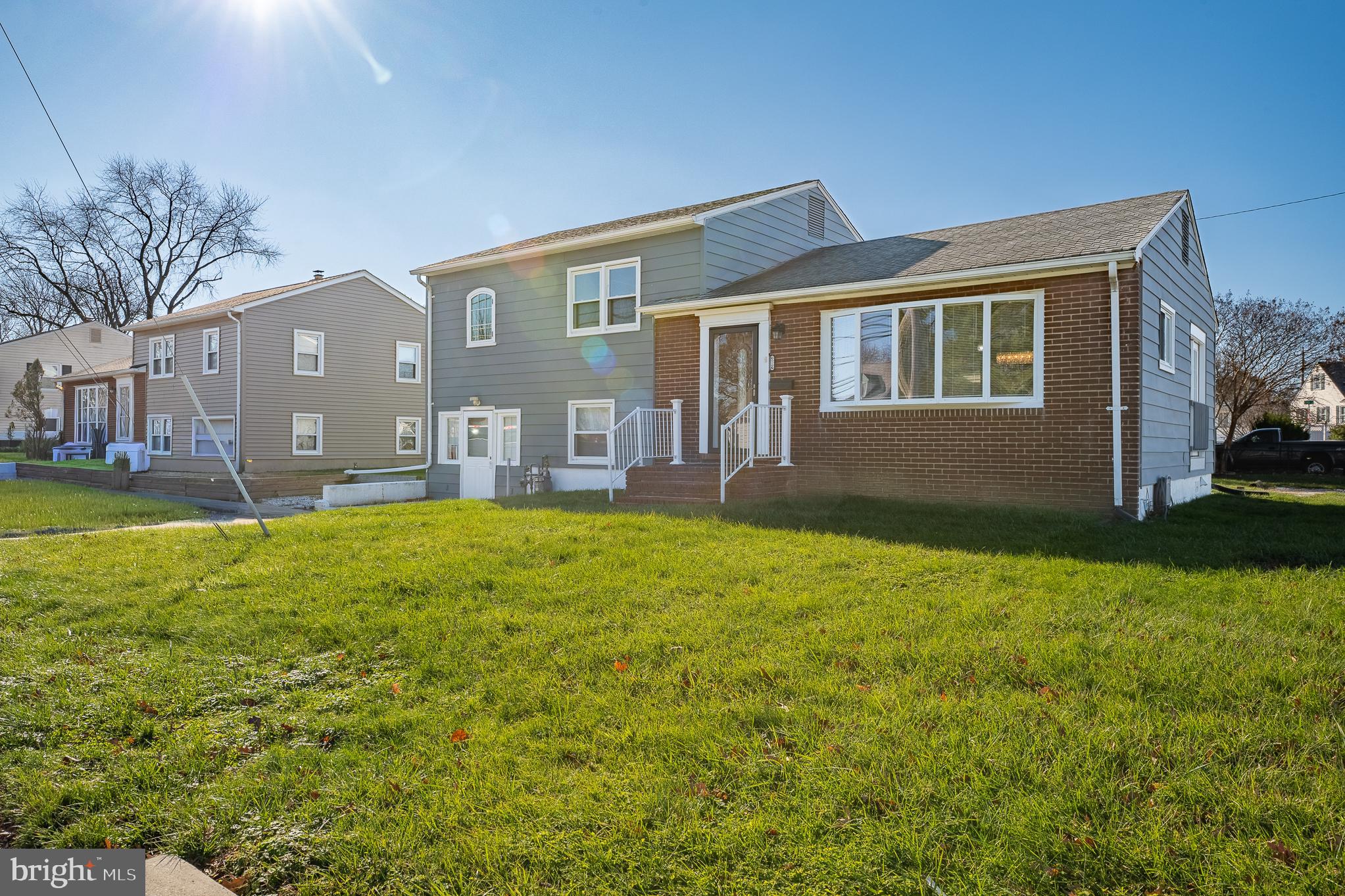 312 North Hammonds Ferry Road Linthicum Heights, MD 21090 - Photo 6 of 56 a front view of house with yard and green space