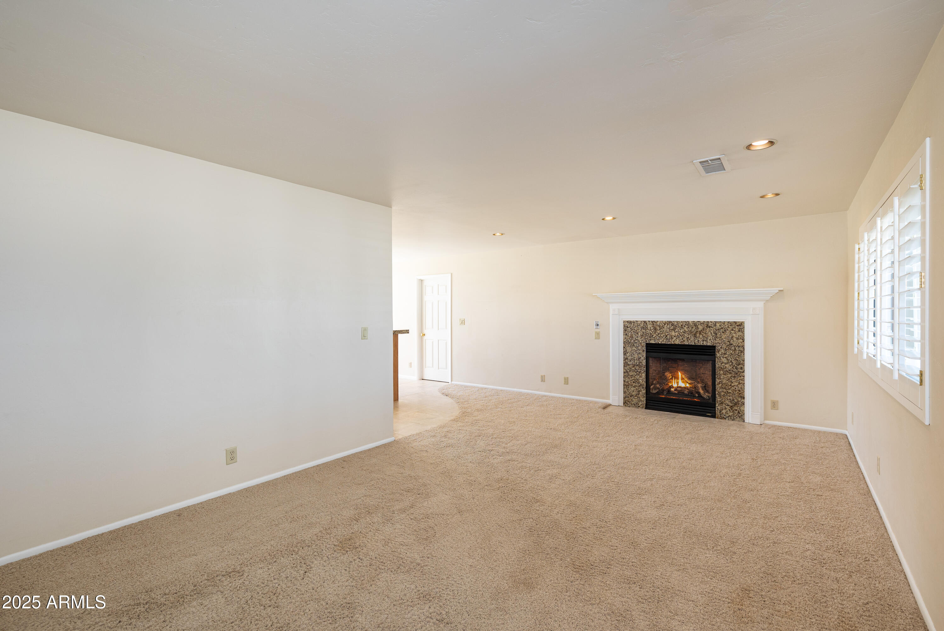 8230 Koch Field Road Flagstaff, AZ 86004 - Photo 24 of 69 a view of an empty room with a window