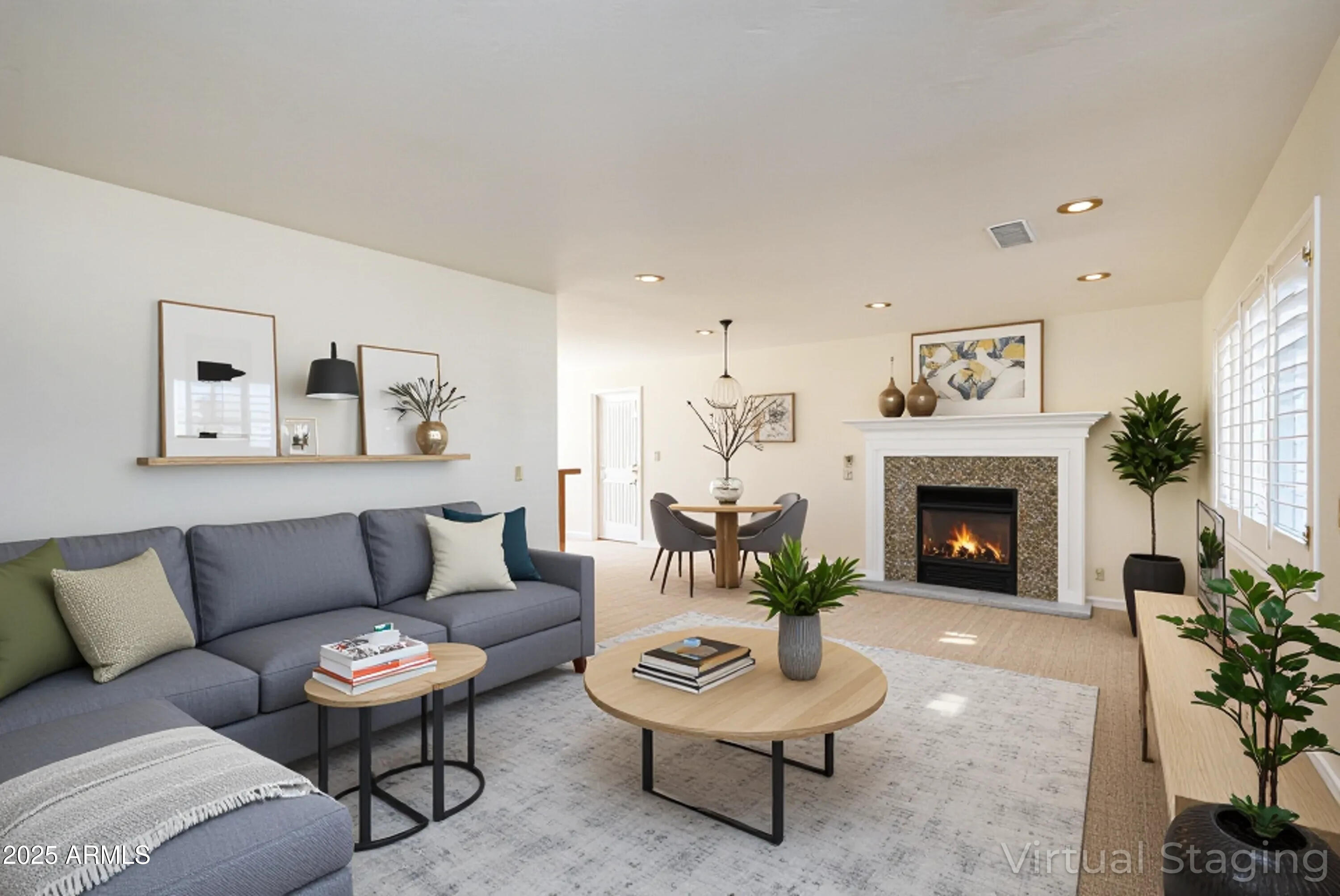 8230 Koch Field Road Flagstaff, AZ 86004 - Photo 25 of 69 a living room with furniture a fireplace and a potted plant