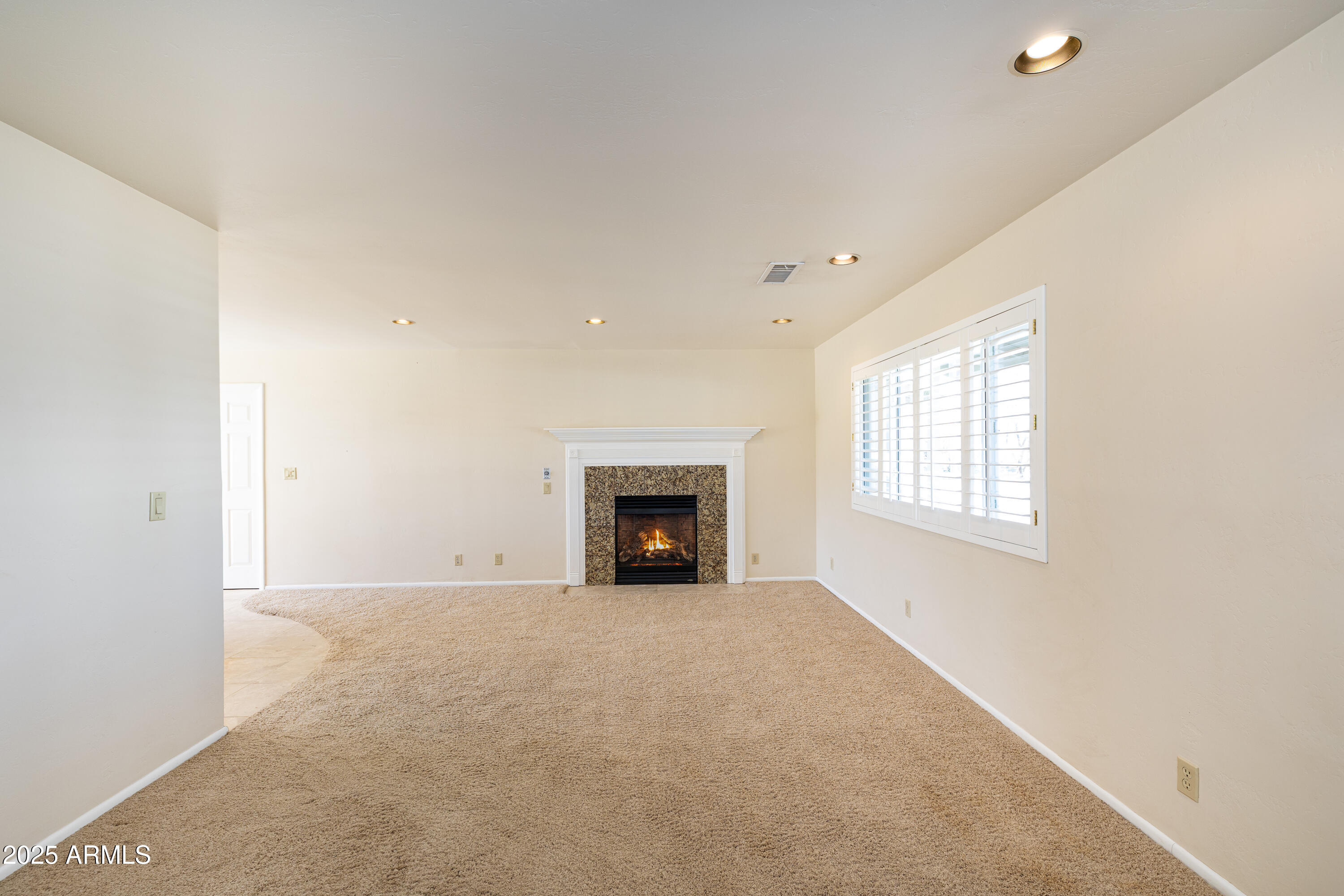 8230 Koch Field Road Flagstaff, AZ 86004 - Photo 26 of 69 a view of an empty room with a window