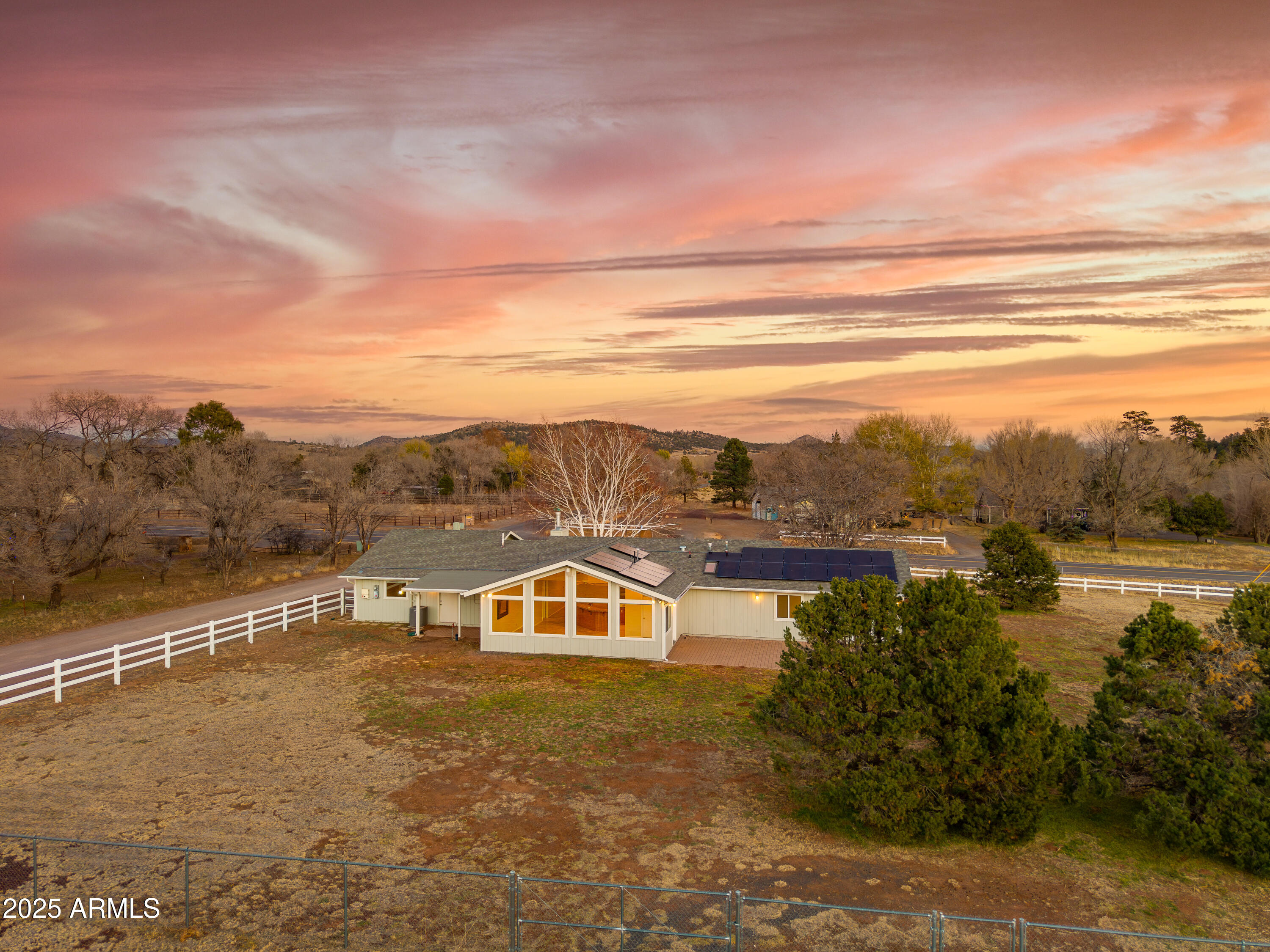 8230 Koch Field Road Flagstaff, AZ 86004 - Photo 3 of 69 a view of a lake with a mountain in the background