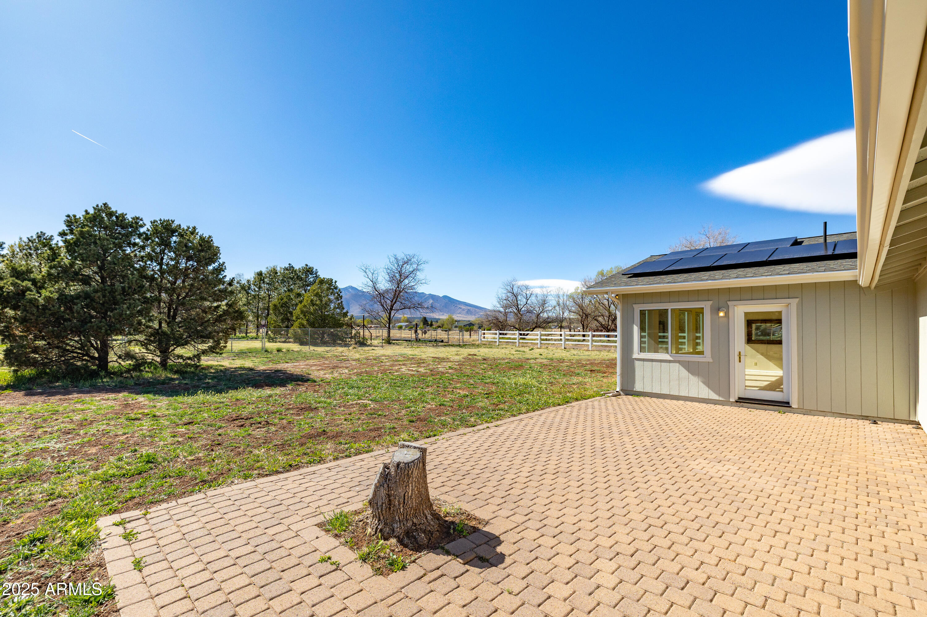 8230 Koch Field Road Flagstaff, AZ 86004 - Photo 53 of 69 a house with swimming pool in front of it