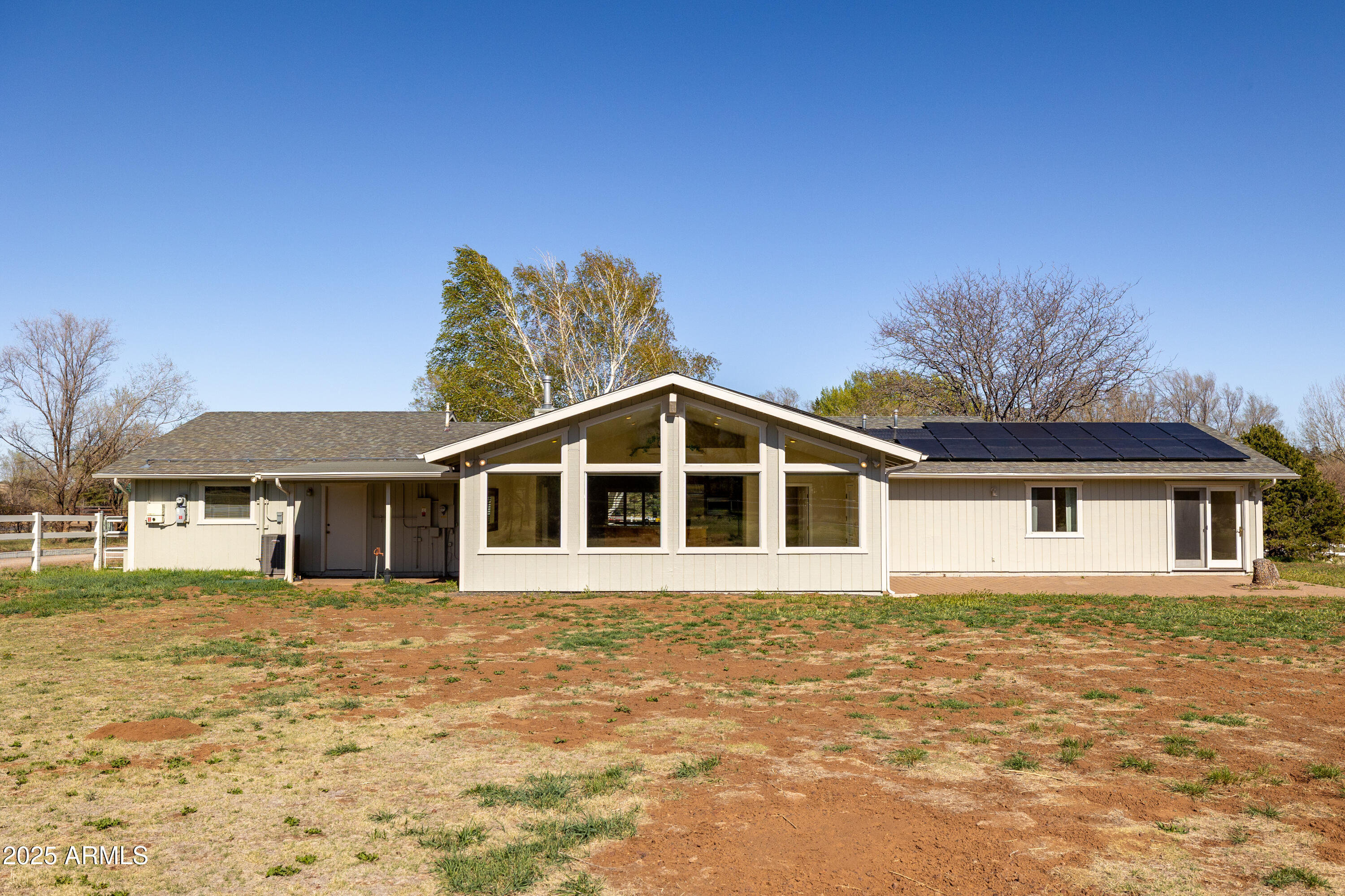 8230 Koch Field Road Flagstaff, AZ 86004 - Photo 57 of 69 a front view of a house with a garden