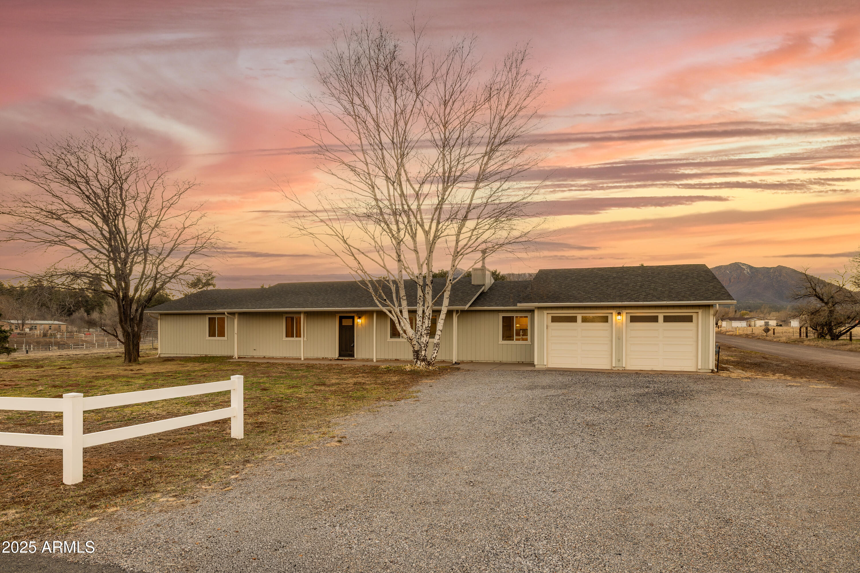 8230 Koch Field Road Flagstaff, AZ 86004 - Photo 62 of 69 a view of a house with a large tree in front of it
