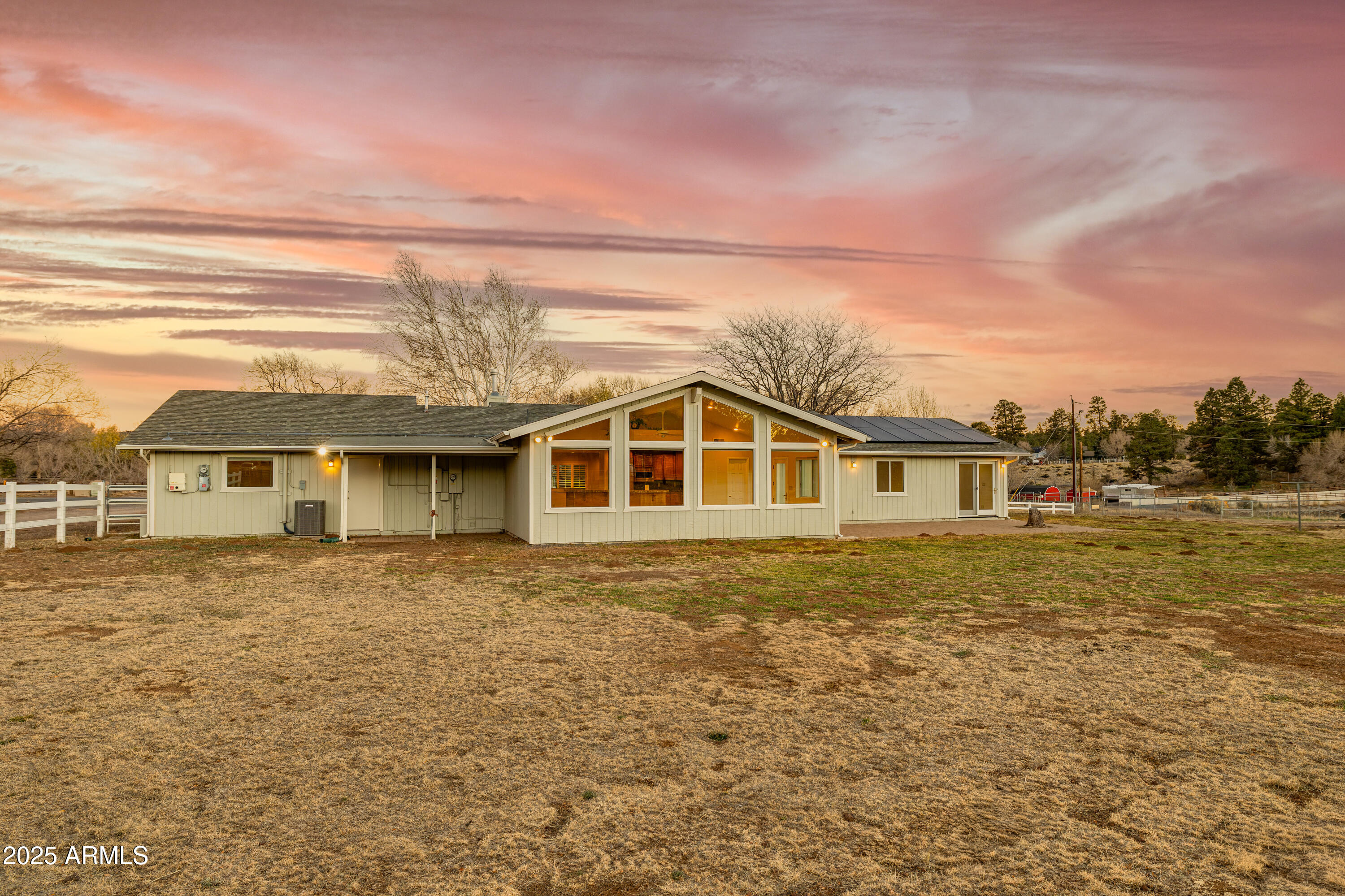 8230 Koch Field Road Flagstaff, AZ 86004 - Photo 65 of 69 a front view of a house with a yard