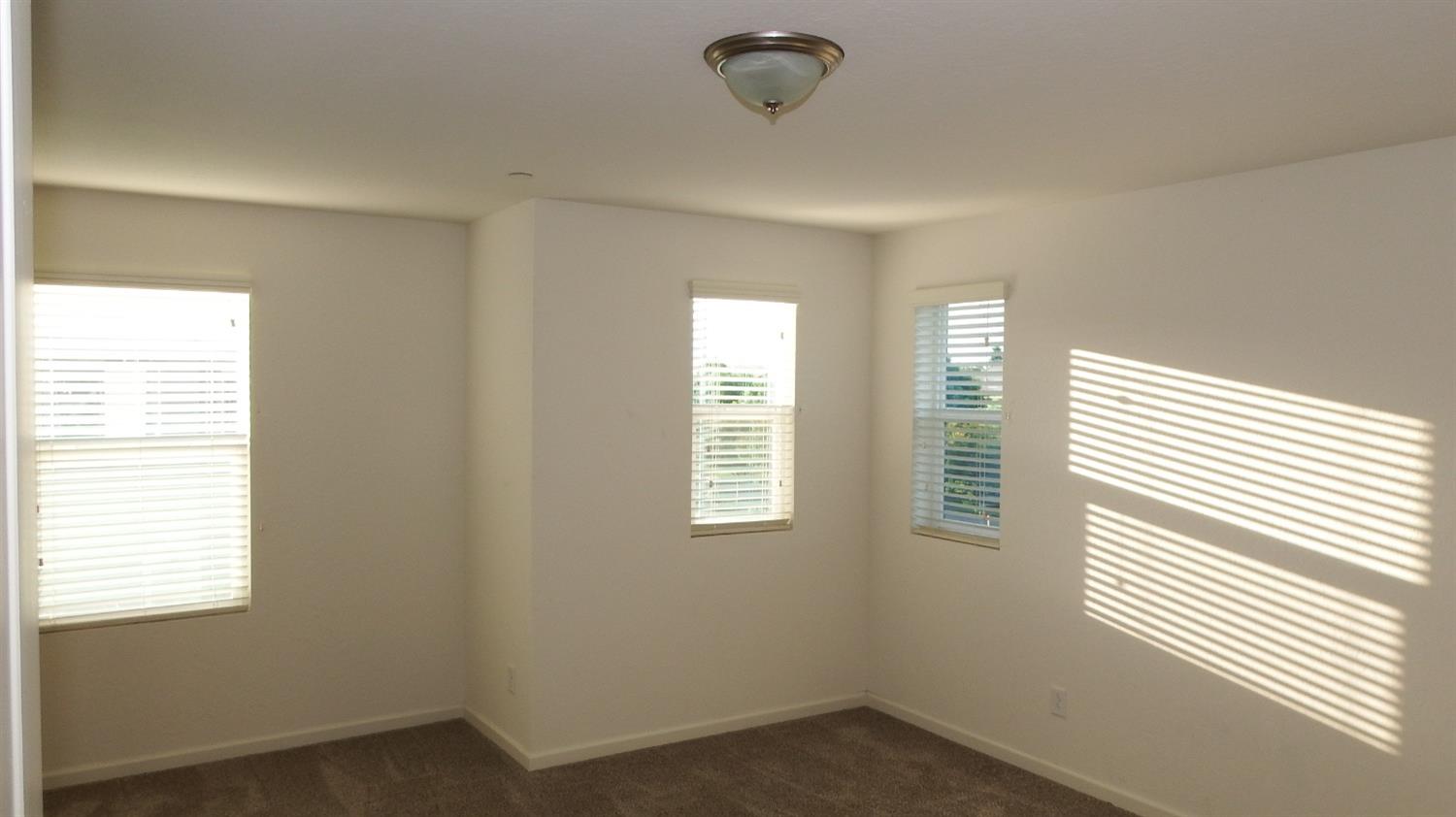 2008 North Walling Lane Clovis, CA 93619 - Photo 4 of 12 a view of an empty room with a window
