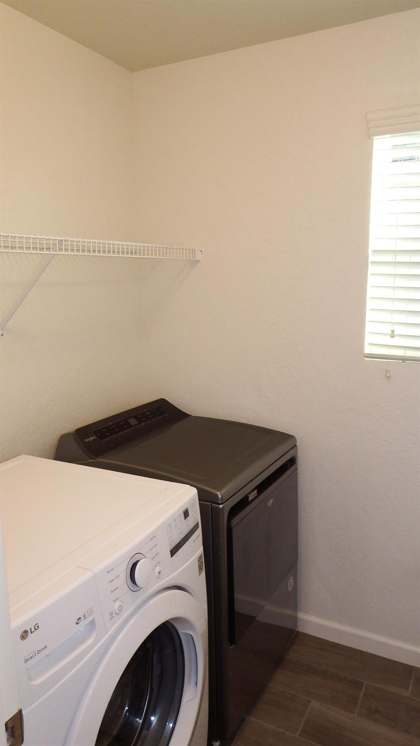 2008 North Walling Lane Clovis, CA 93619 - Photo 10 of 12 a utility room with dryer and washer