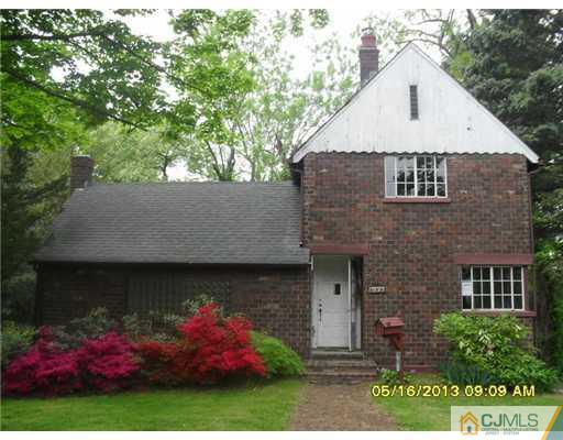 130 West Hill Road Colonia, NJ 07067 - Photo 1 of 7 a aerial view of a house