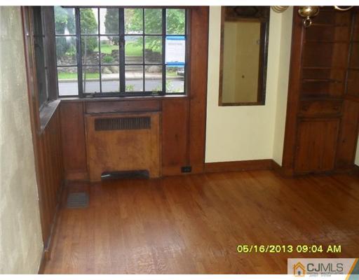 130 West Hill Road Colonia, NJ 07067 - Photo 4 of 7 a view of an empty room with a window