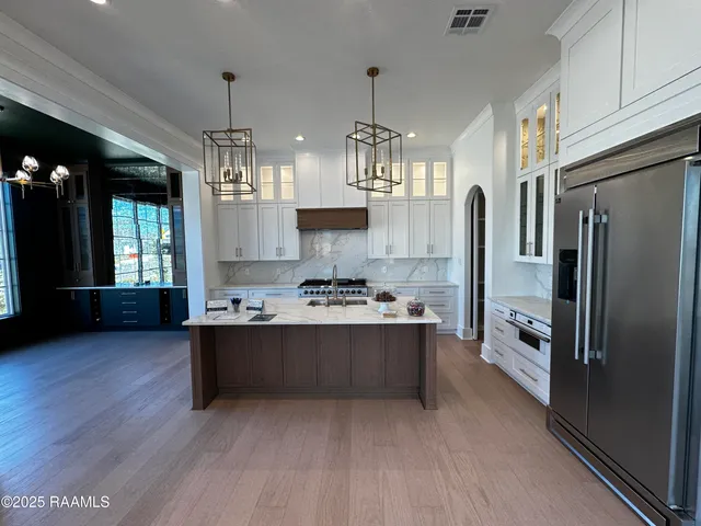 $750,000 | 100 Travellers Palm Way, Youngsville, LA 70592