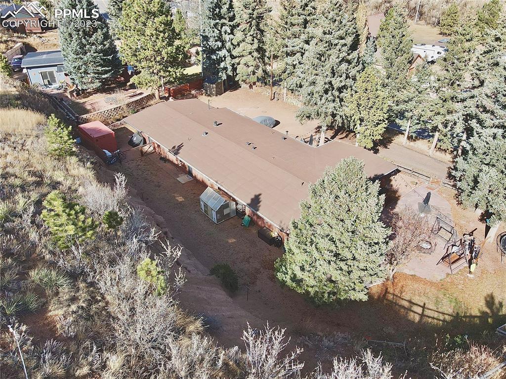 8715 Chipita Park Road Cascade, CO 80809 - Photo 3 of 25 an aerial view of a house with a yard