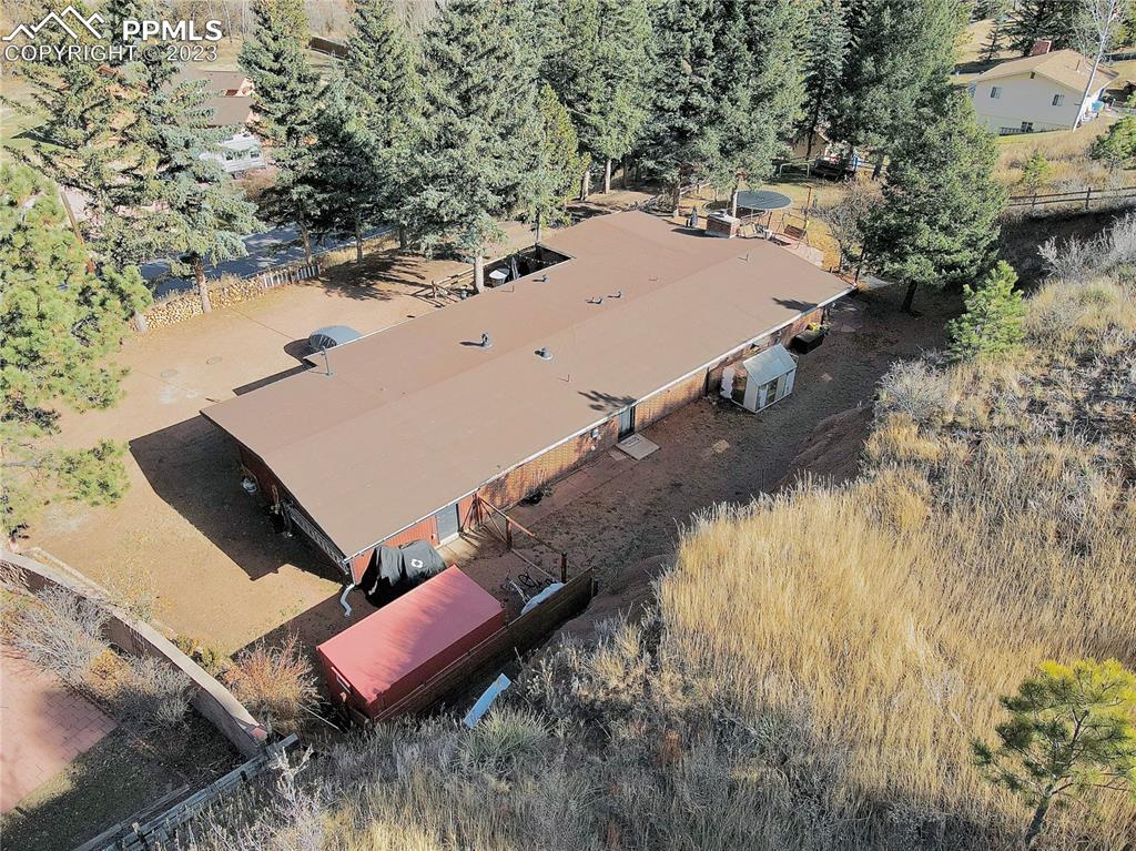 8715 Chipita Park Road Cascade, CO 80809 - Photo 4 of 25 an aerial view of residential houses with outdoor space