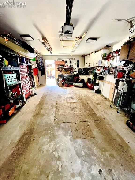 8715 Chipita Park Road Cascade, CO 80809 - Photo 8 of 25 a view of parking garage with cars