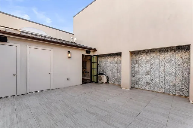 a picture of a bathroom with a shower