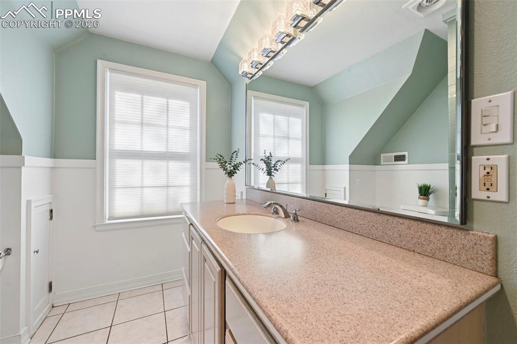 21 Sumner Street Colorado Springs, CO 80906 - Photo 27 of 48 Primary Bedroom ensuite bathroom