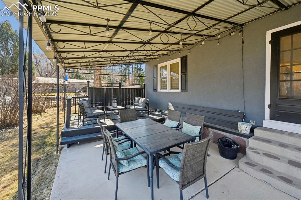 21 Sumner Street Colorado Springs, CO 80906 - Photo 8 of 48 Outdoor covered patio dining off of formal dining room french doors