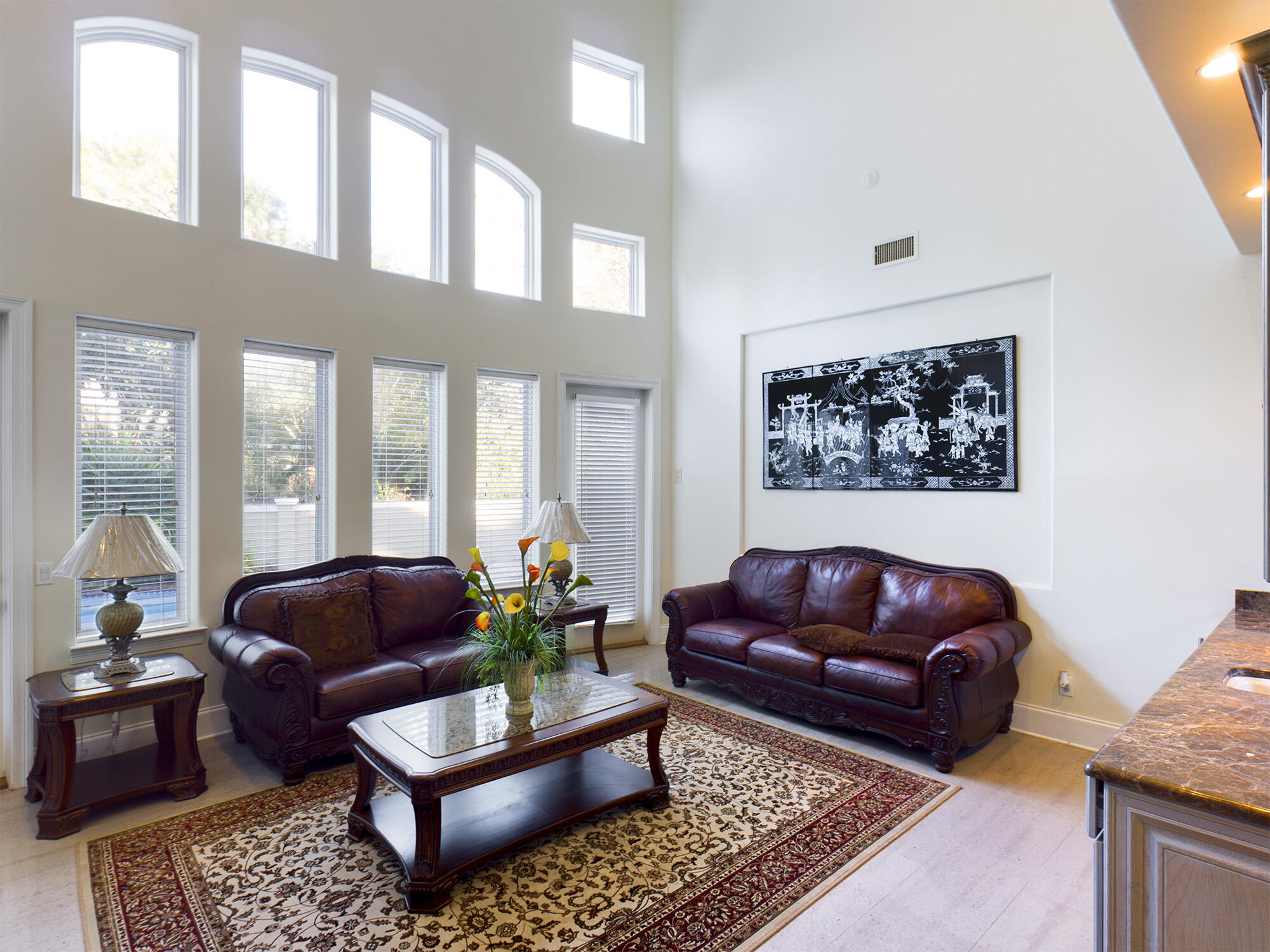 263 Leaning Pines Loop Destin, FL 32541 - Photo 12 of 58 a living room with furniture a rug and a large window