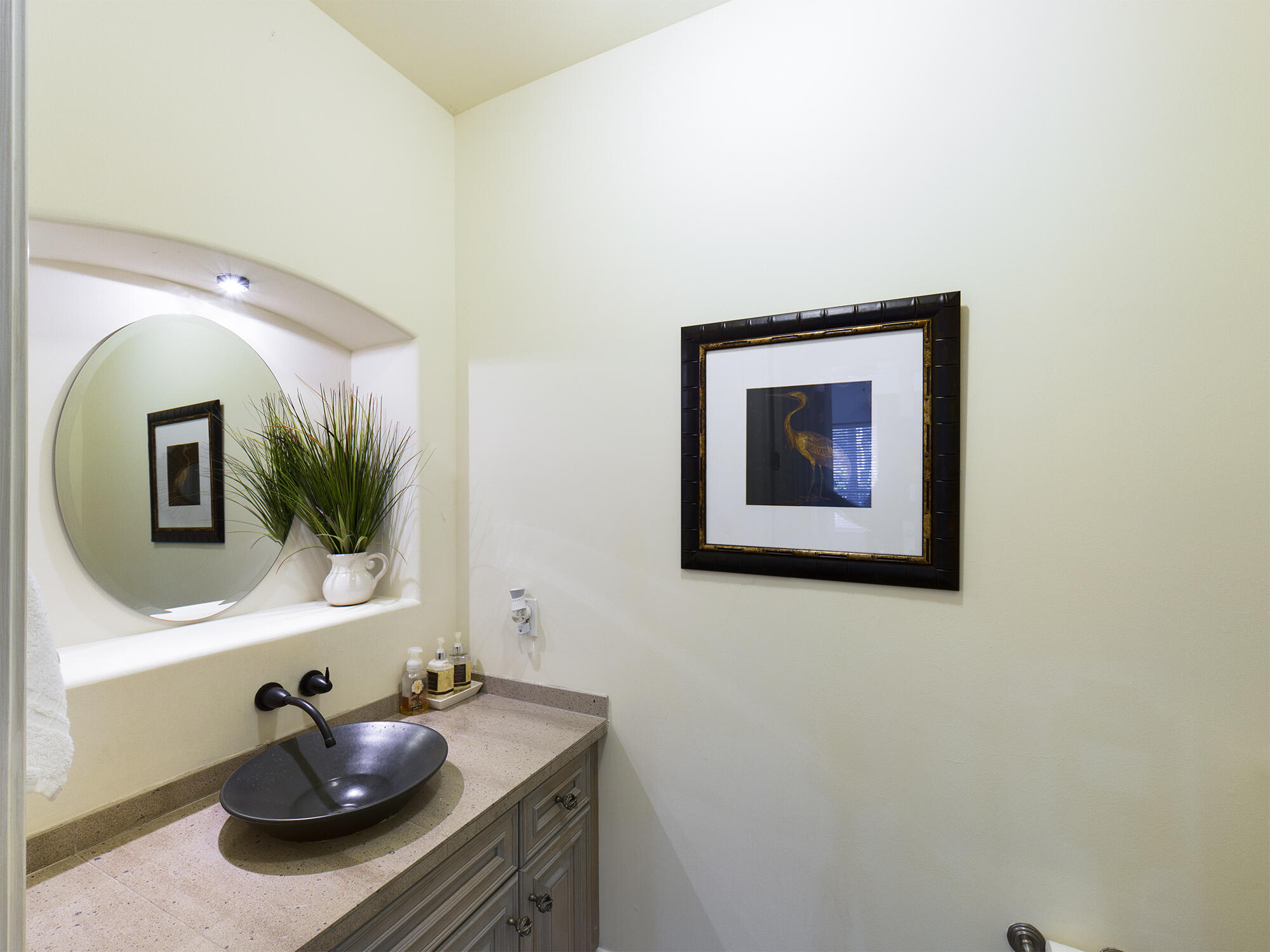 263 Leaning Pines Loop Destin, FL 32541 - Photo 18 of 58 a bathroom with a sink and a mirror