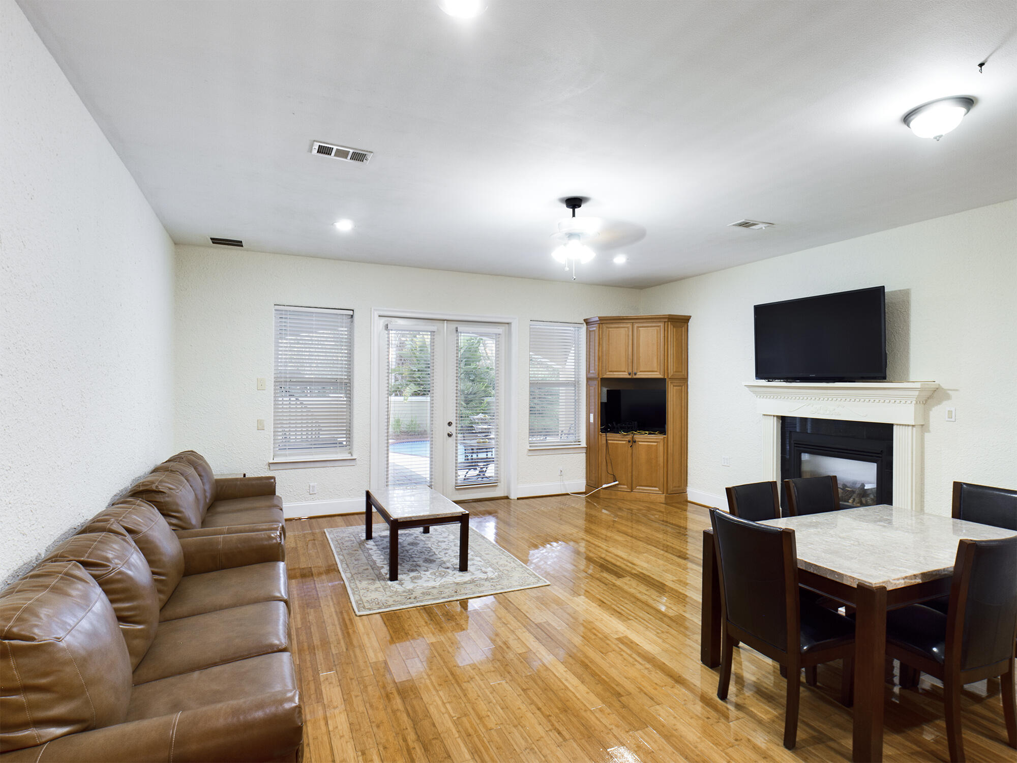 263 Leaning Pines Loop Destin, FL 32541 - Photo 23 of 58 a living room with furniture and a flat screen tv