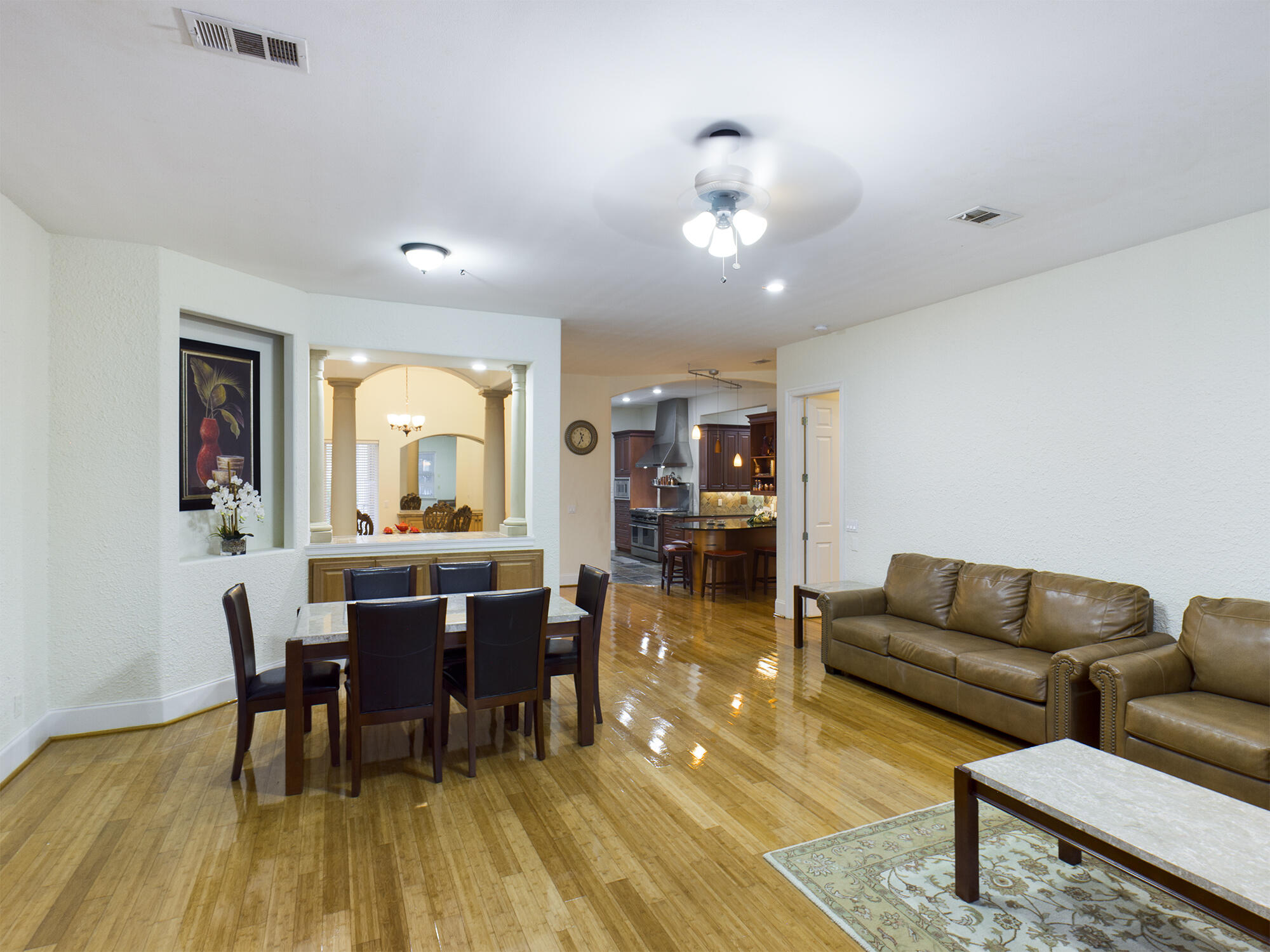 263 Leaning Pines Loop Destin, FL 32541 - Photo 24 of 58 a living room with furniture and wooden floor