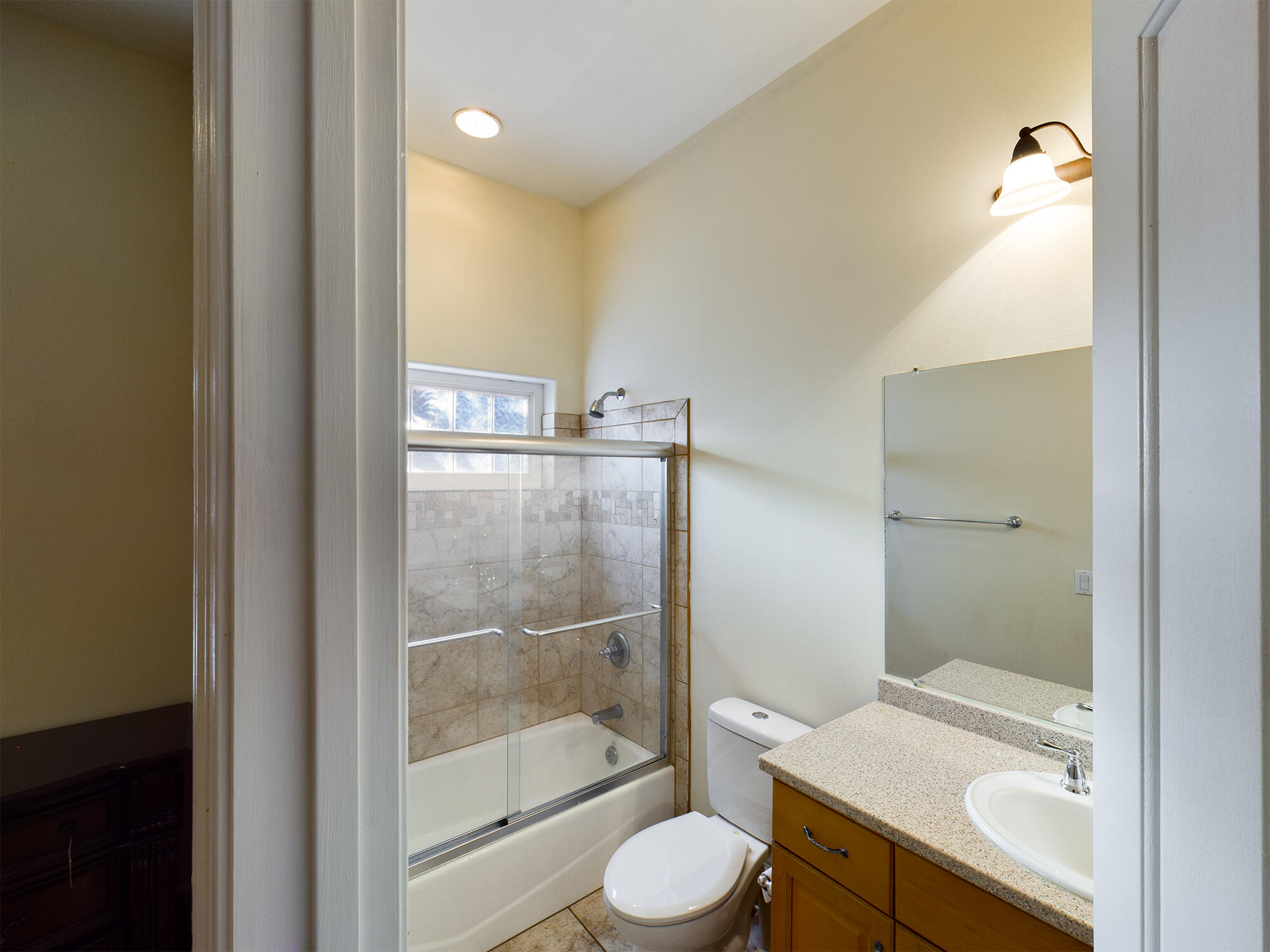 263 Leaning Pines Loop Destin, FL 32541 - Photo 26 of 58 a bathroom with a granite countertop sink a toilet and shower