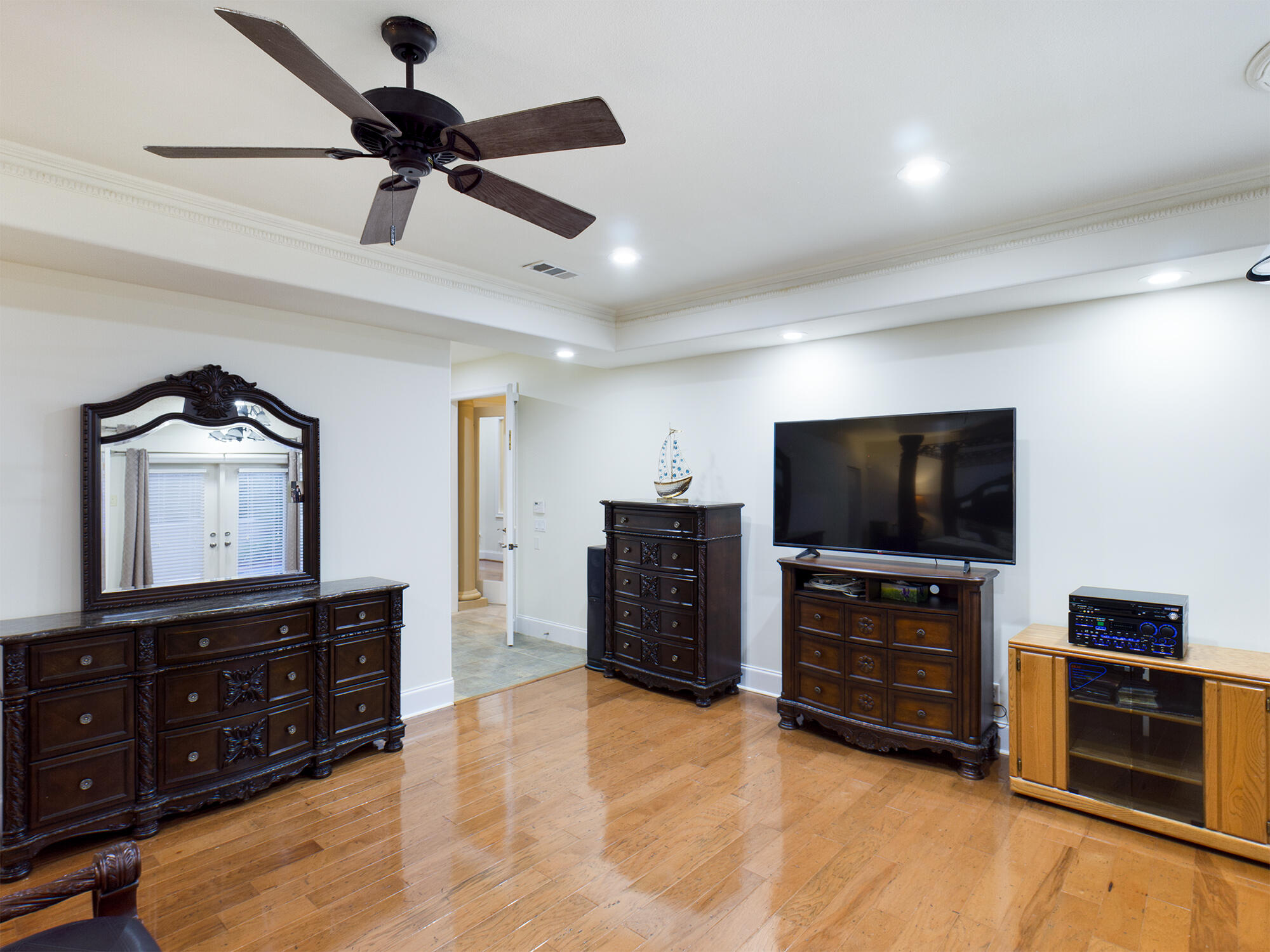 263 Leaning Pines Loop Destin, FL 32541 - Photo 28 of 58 a view of a livingroom with furniture and a flat screen tv