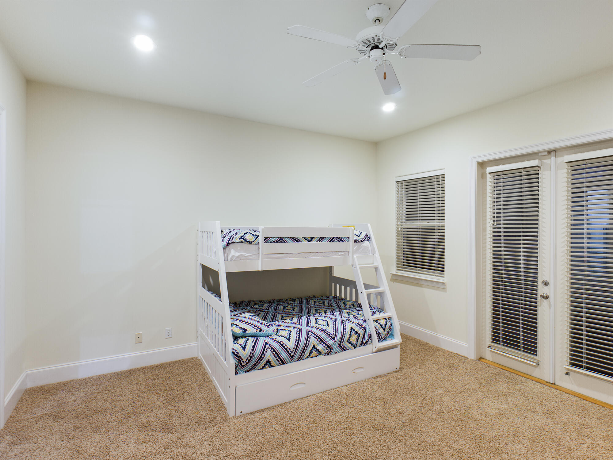 263 Leaning Pines Loop Destin, FL 32541 - Photo 33 of 58 a spacious bedroom with a bed and a window