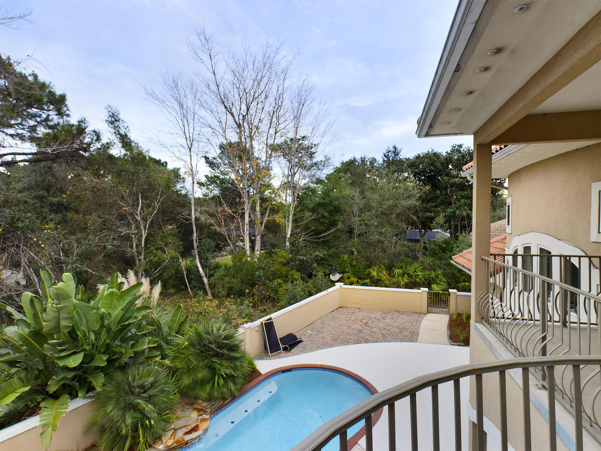 263 Leaning Pines Loop Destin, FL 32541 - Photo 37 of 58 a view of a patio in backyard