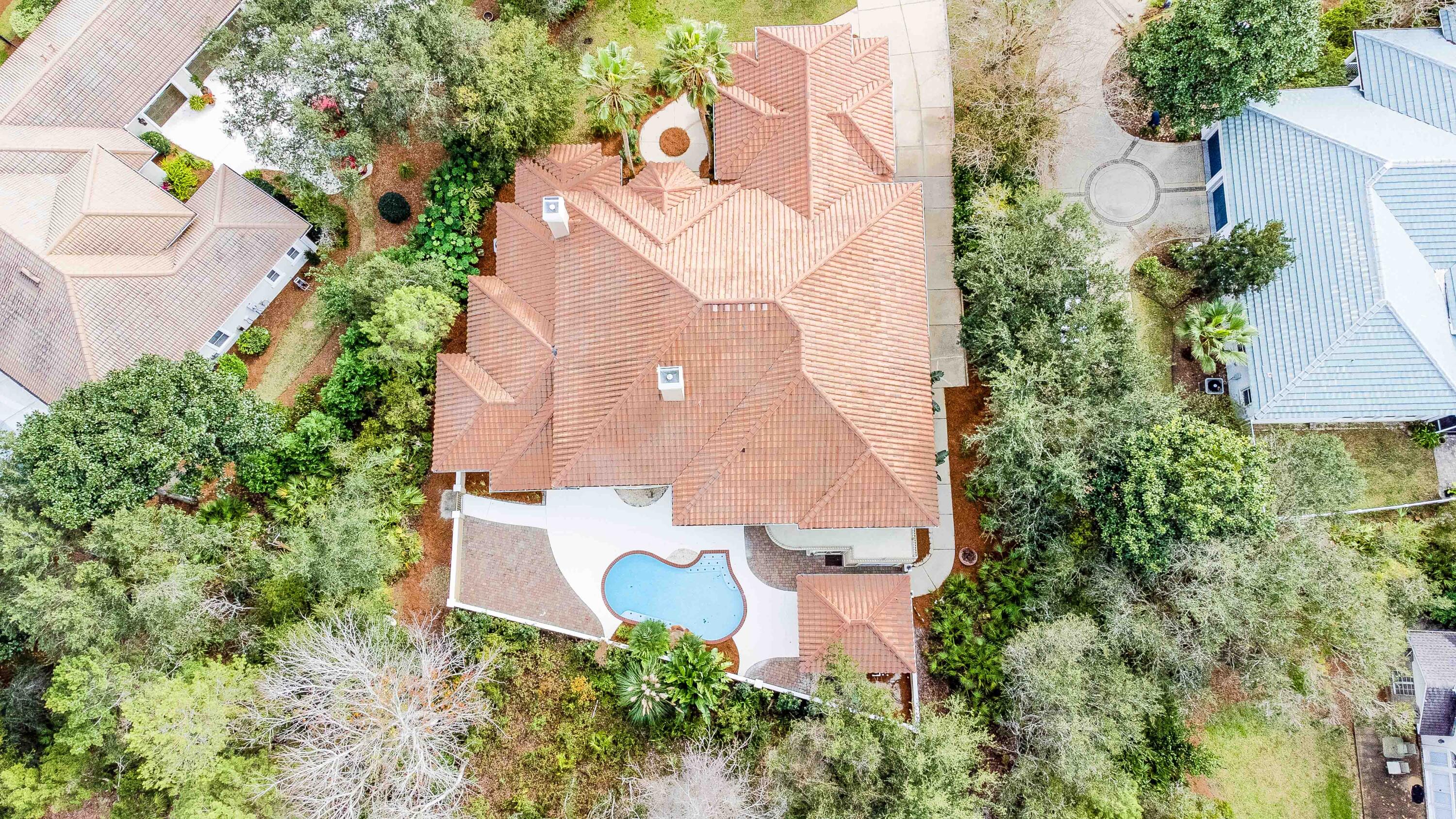 263 Leaning Pines Loop Destin, FL 32541 - Photo 44 of 58 an aerial view of a house with a garden
