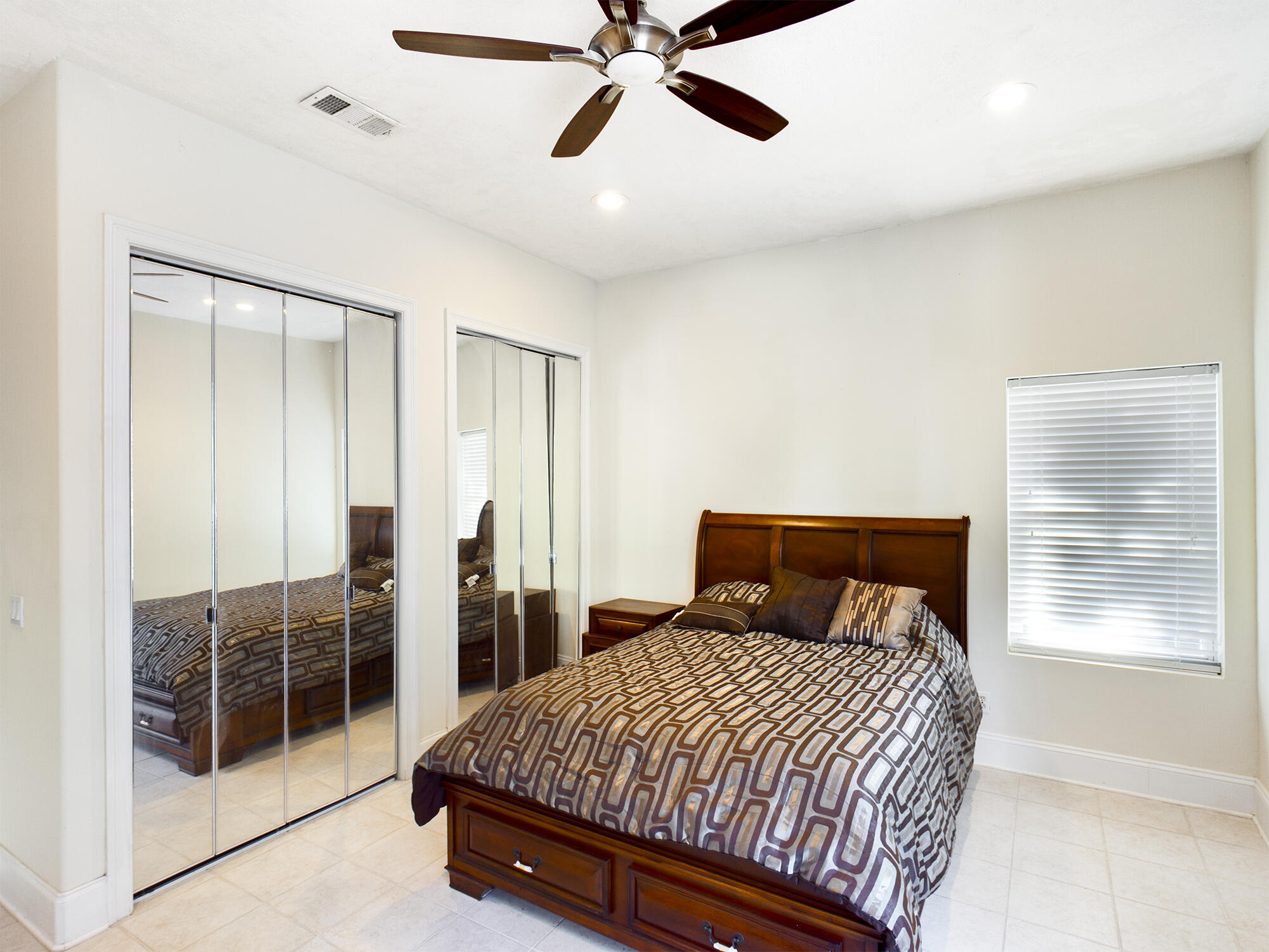 263 Leaning Pines Loop Destin, FL 32541 - Photo 45 of 58 a bedroom with a bed and dresser