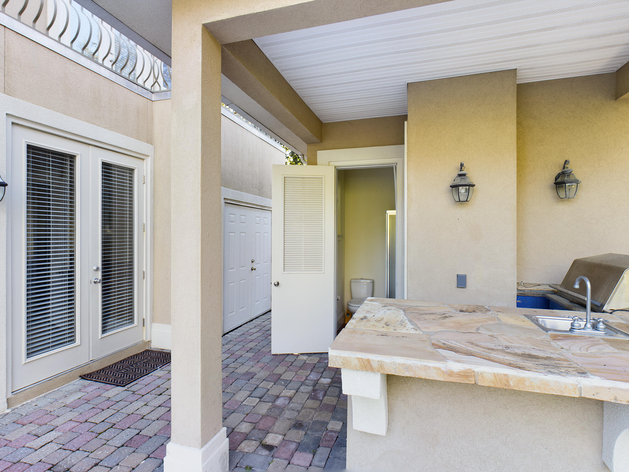 263 Leaning Pines Loop Destin, FL 32541 - Photo 48 of 58 a bathroom with a sink and a mirror