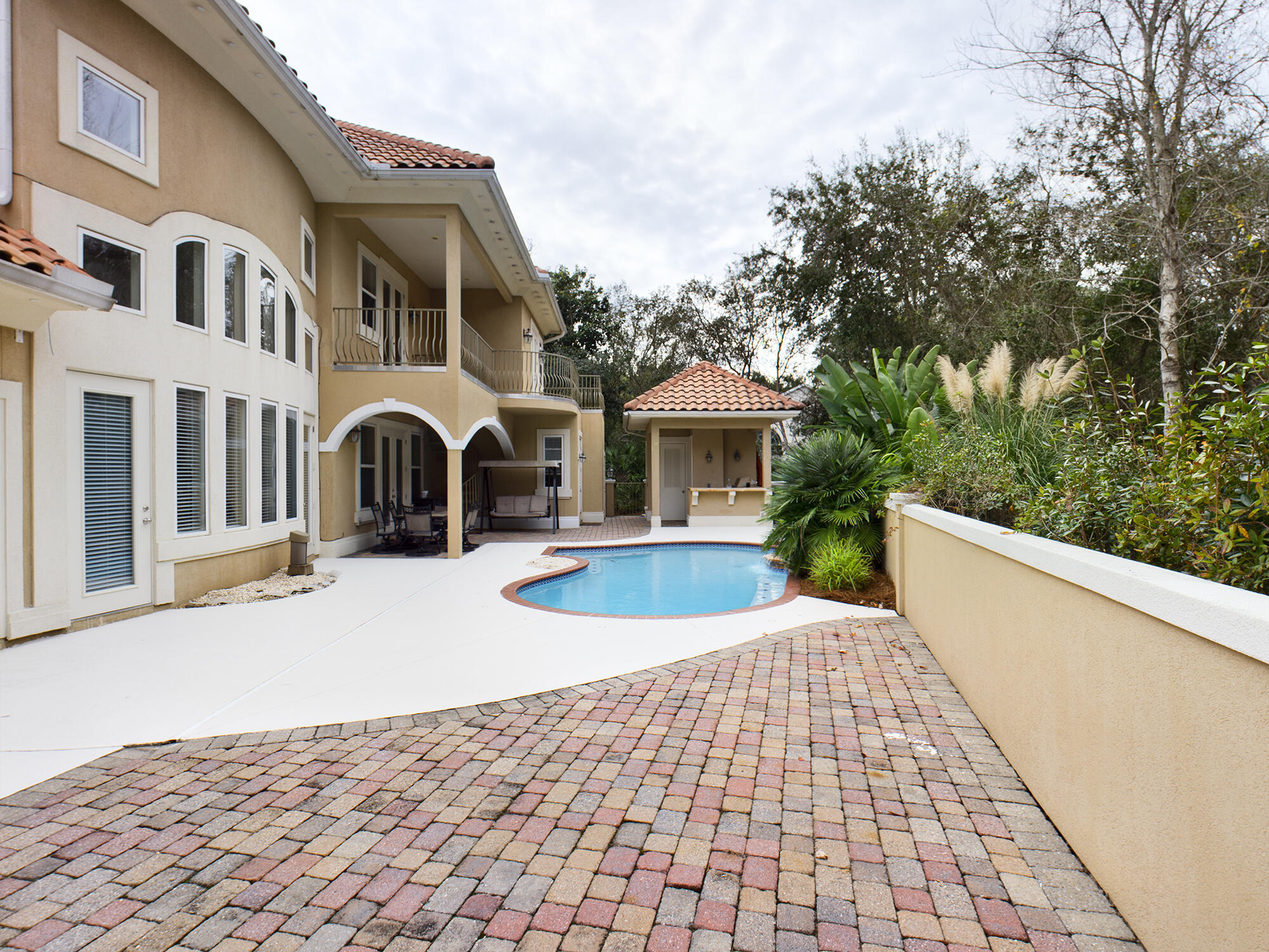 263 Leaning Pines Loop Destin, FL 32541 - Photo 49 of 58 a view of a white building with a outdoor space
