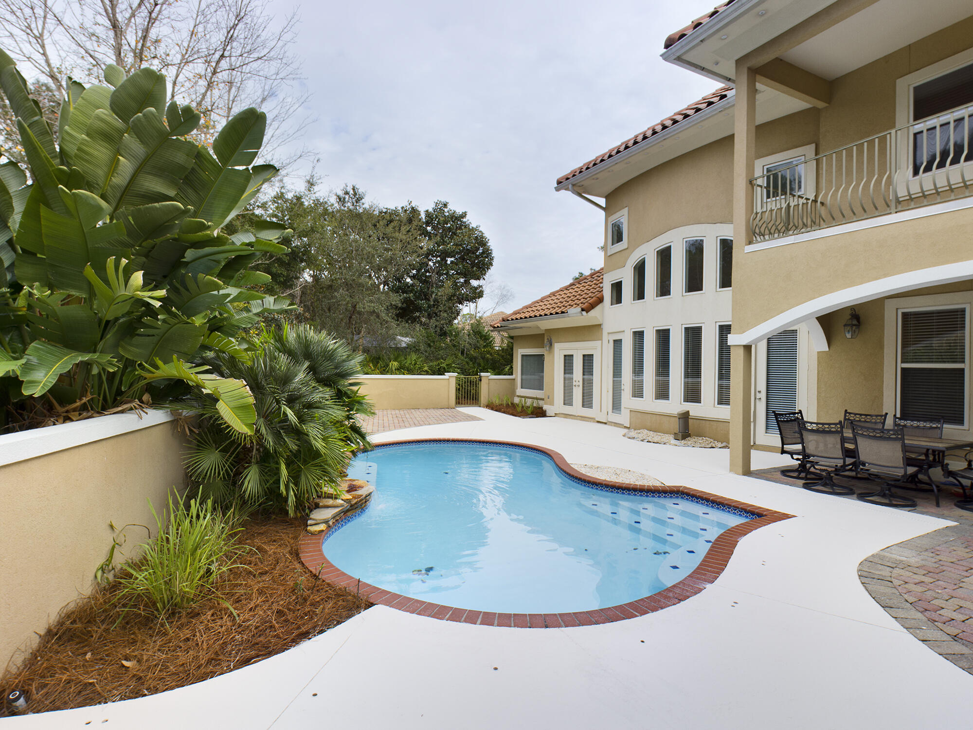 263 Leaning Pines Loop Destin, FL 32541 - Photo 50 of 58 a view of a house with swimming pool