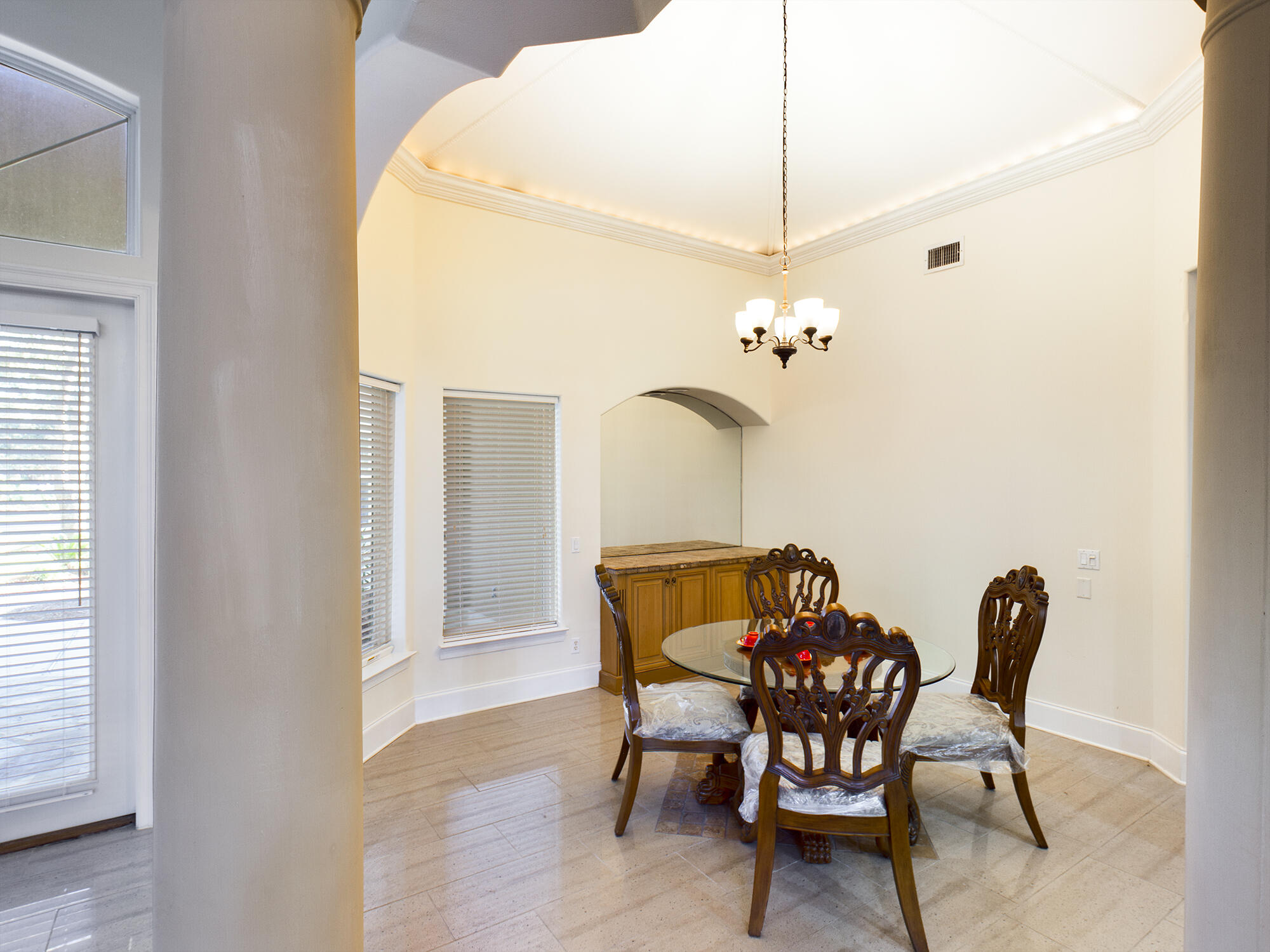 263 Leaning Pines Loop Destin, FL 32541 - Photo 10 of 58 a view of a dining room with furniture and a chandelier