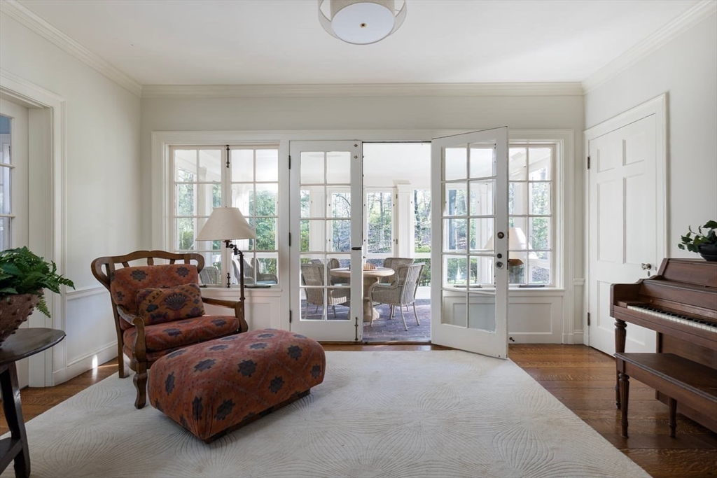 300 Warren Street Brookline, MA 02445 - Photo 6 of 35 a living room with furniture and a large window