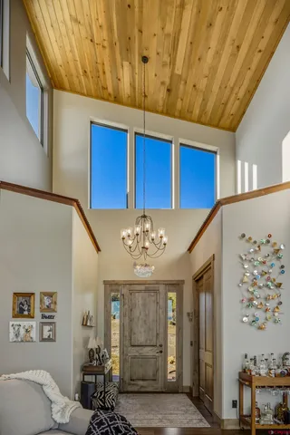 a view of a living room filled with furniture
