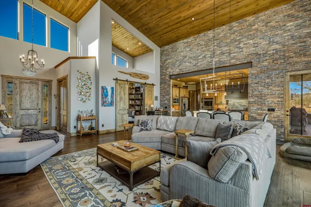 a view of a patio with table and chairs