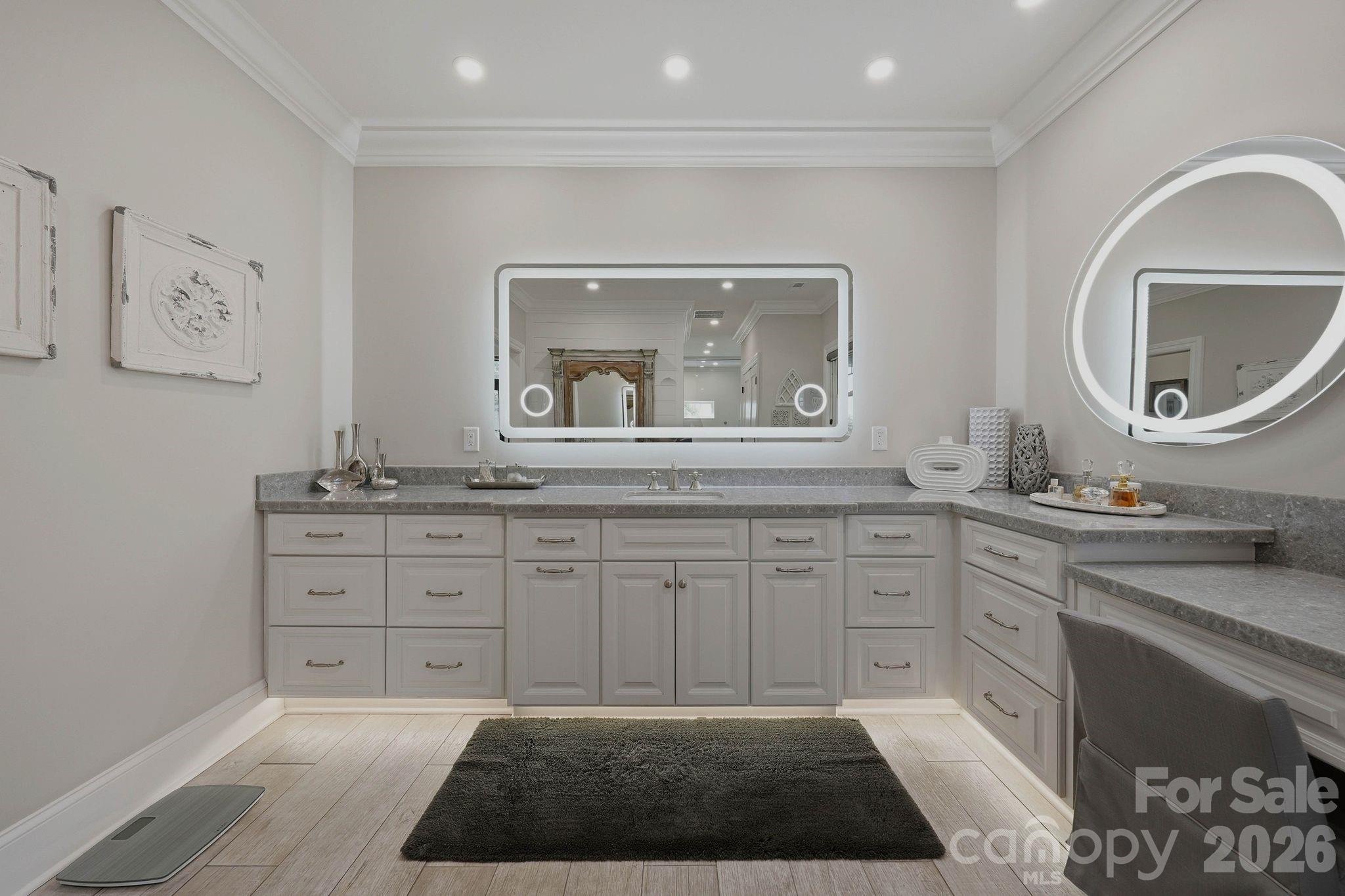605 Recore Rdg Road Bessemer City, NC 28016 - Photo 17 of 47 a spacious bathroom with a granite countertop sink and a mirror