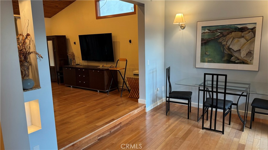 2117 Colby Avenue West Los Angeles, CA 90025 - Photo 5 of 43 a living room with furniture and a flat screen tv