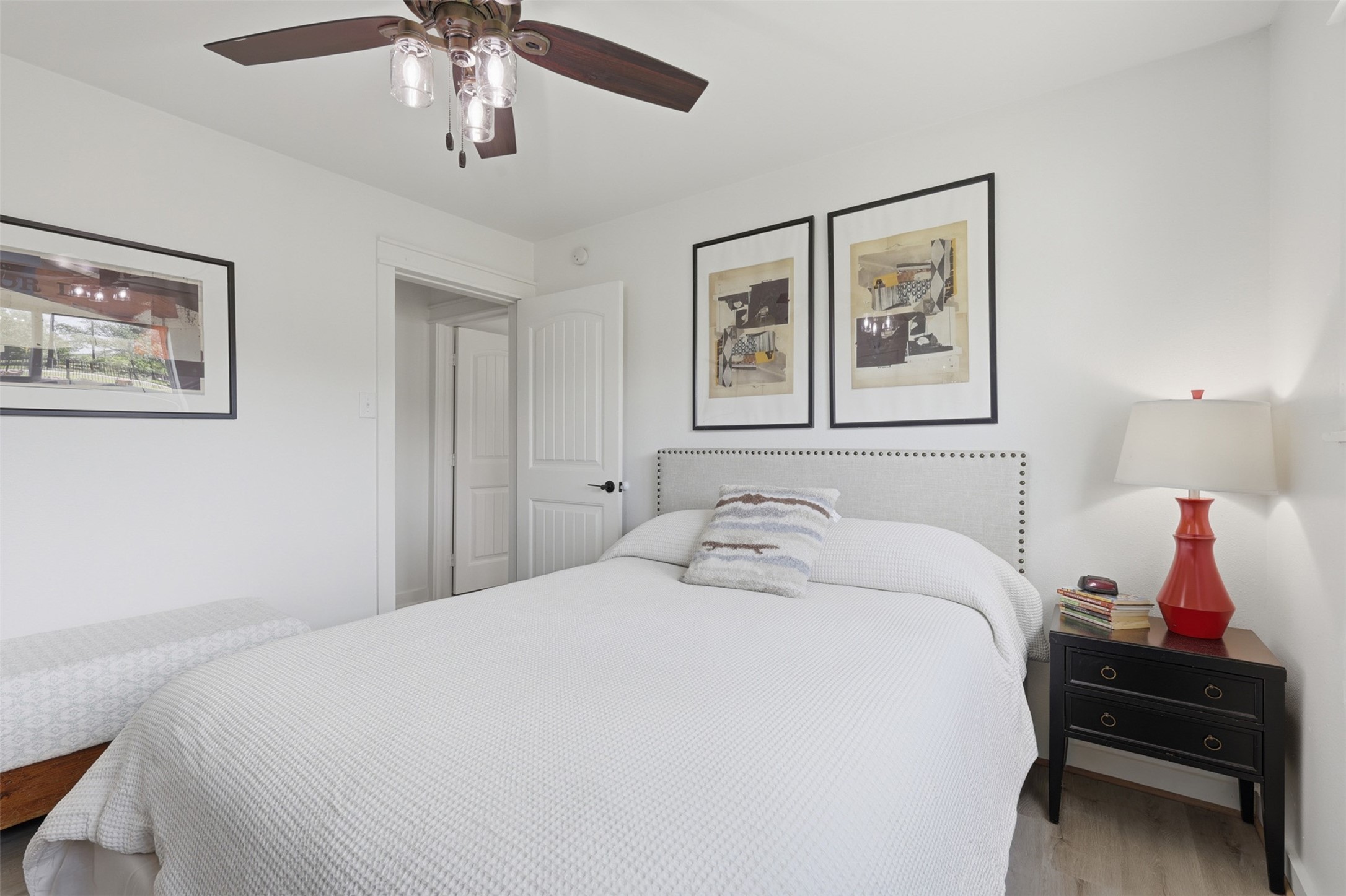 5111 Brookside Road Pearland, TX 77581 - Photo 20 of 42 Inviting third bedroom featuring elegant decor, ample natural light, and a cozy atmosphere for relaxation.