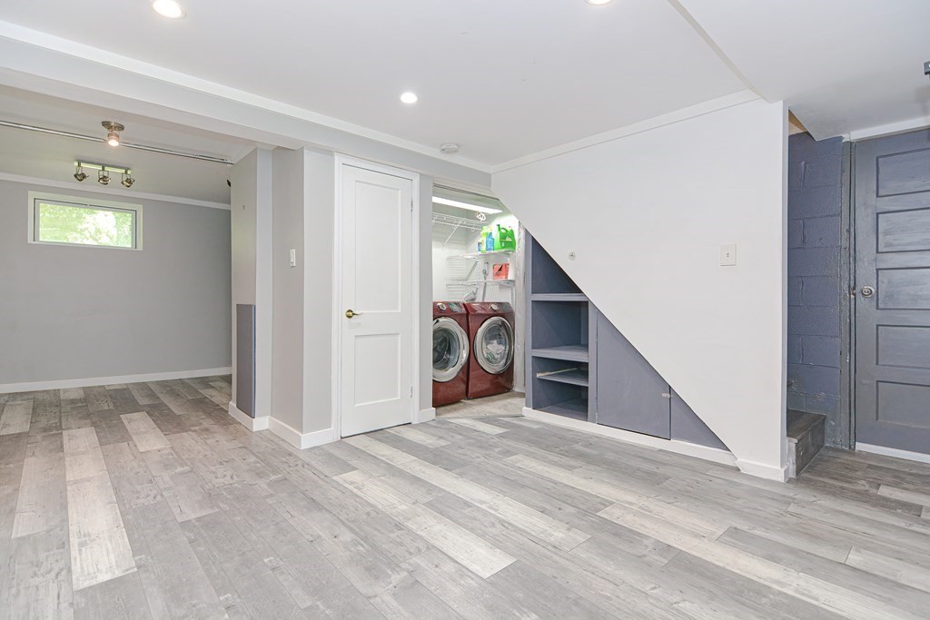183 Brickel Road Stoughton, MA 02072 - Photo 28 of 38 a view of a big room with closet and windows