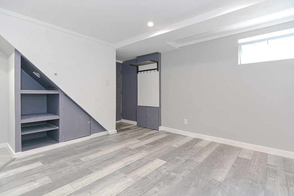 183 Brickel Road Stoughton, MA 02072 - Photo 29 of 38 a view of an empty room with closet and stairs