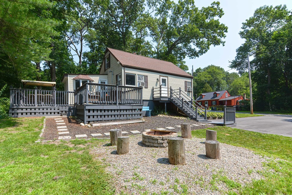 183 Brickel Road Stoughton, MA 02072 - Photo 34 of 38 a view of a house with backyard porch and sitting area