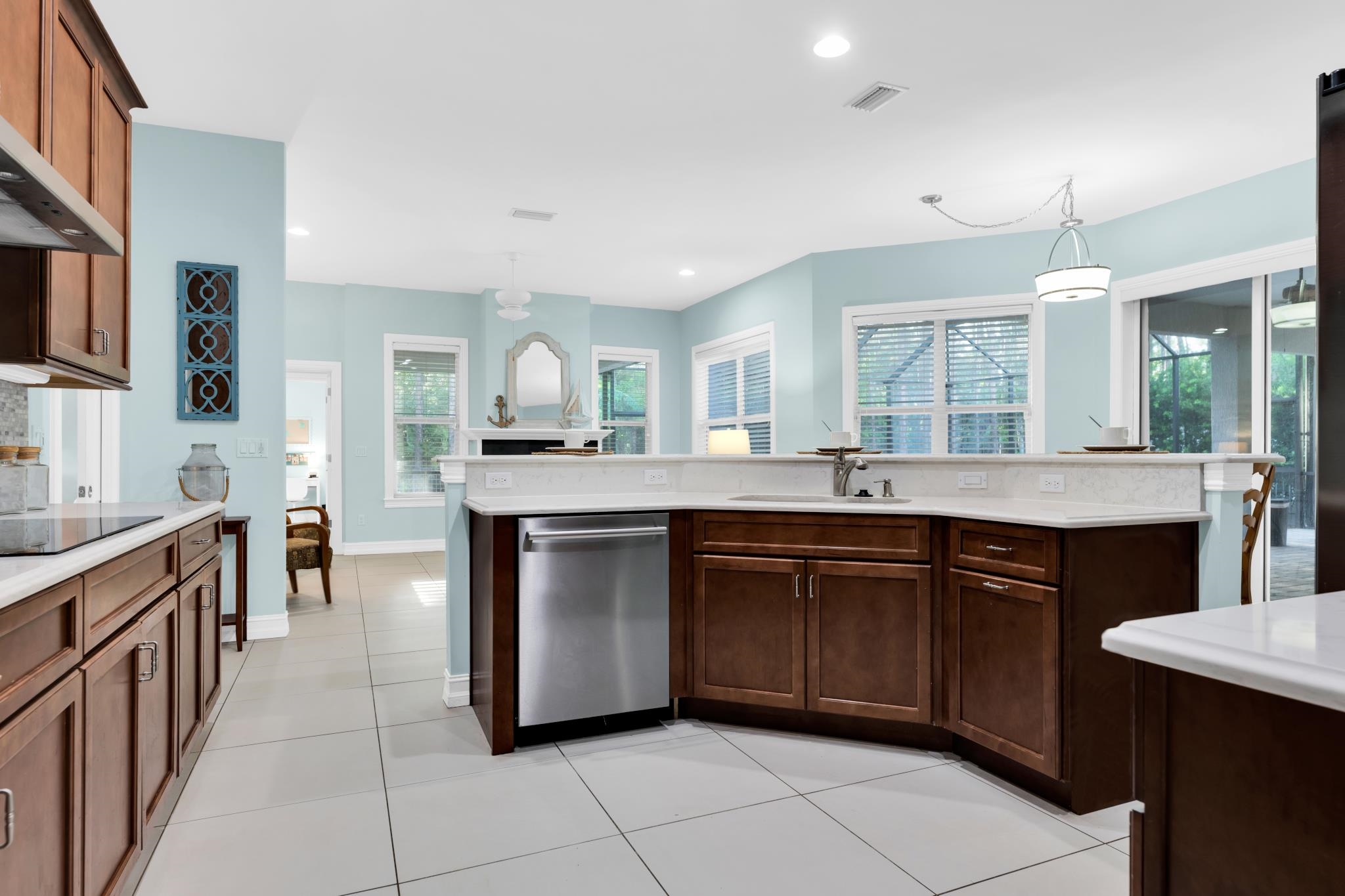 113 Needle Palm Drive St. Augustine, FL 32086 - Photo 13 of 46 a large kitchen with granite countertop a sink and cabinets