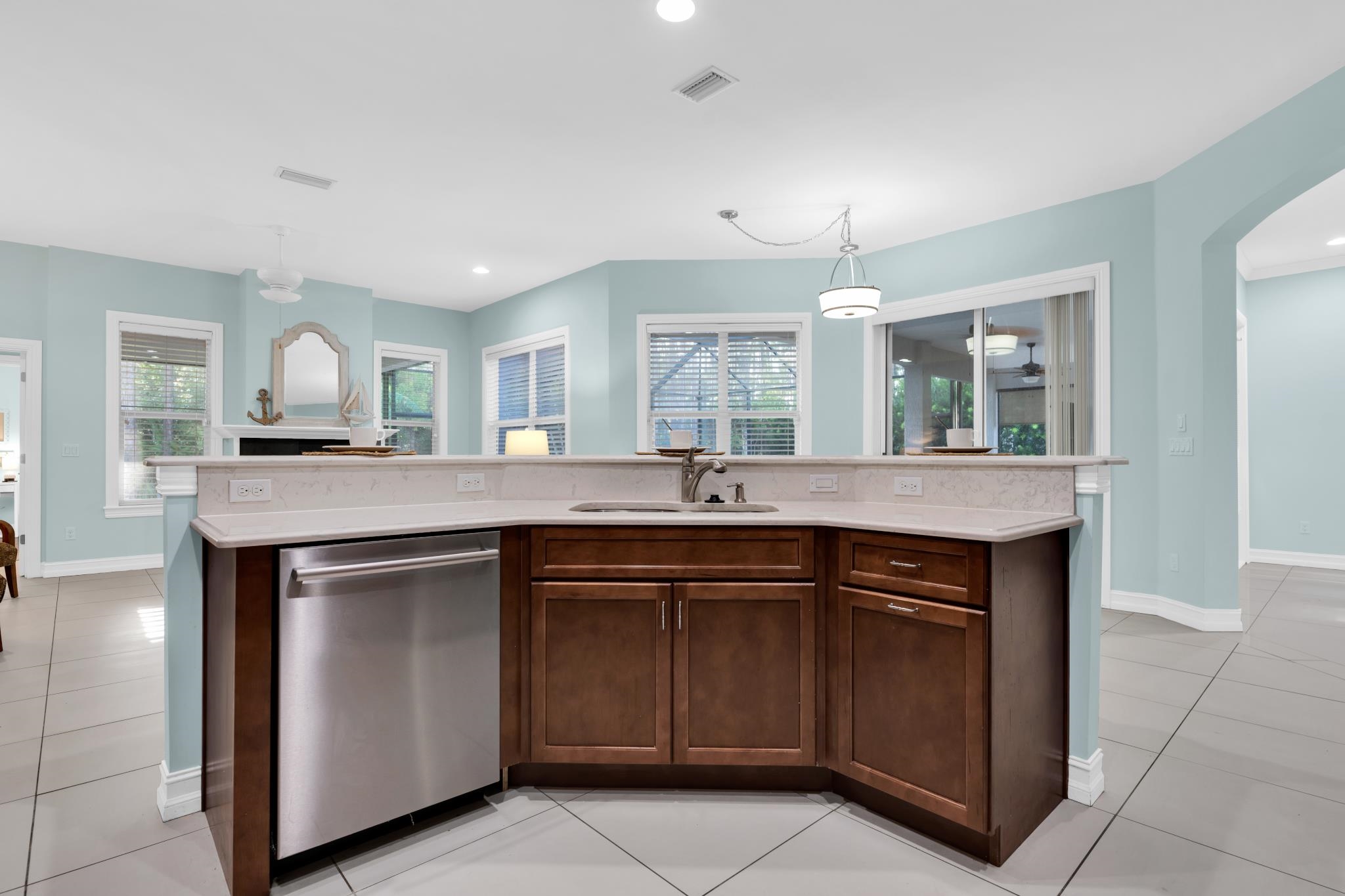 113 Needle Palm Drive St. Augustine, FL 32086 - Photo 14 of 46 a kitchen with granite countertop a sink and cabinets
