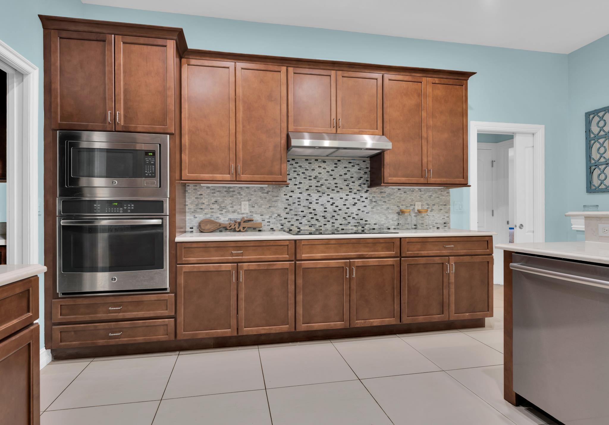 113 Needle Palm Drive St. Augustine, FL 32086 - Photo 15 of 46 a kitchen with granite countertop stainless steel appliances and cabinets