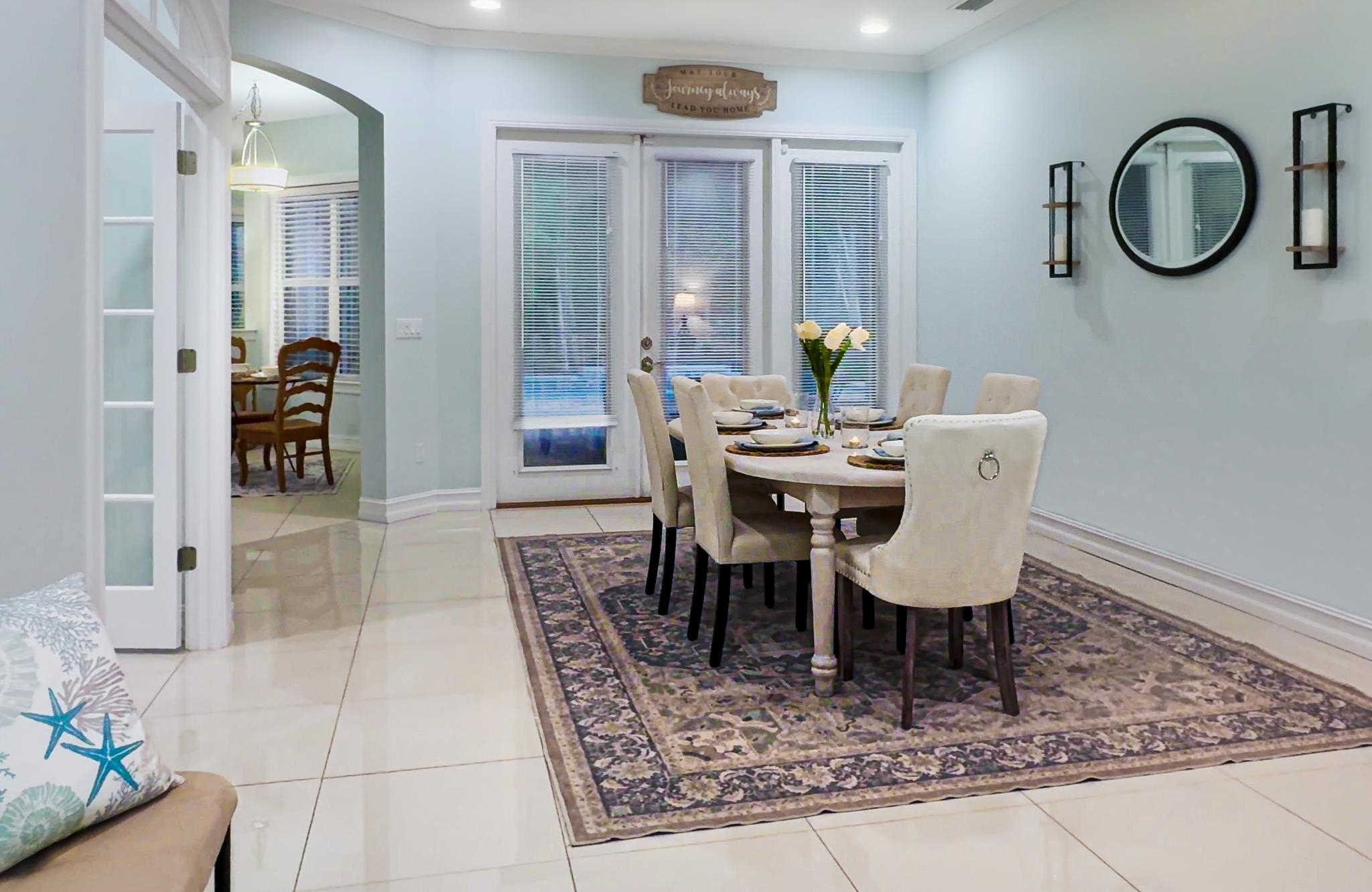 113 Needle Palm Drive St. Augustine, FL 32086 - Photo 2 of 46 a view of a dining room with furniture